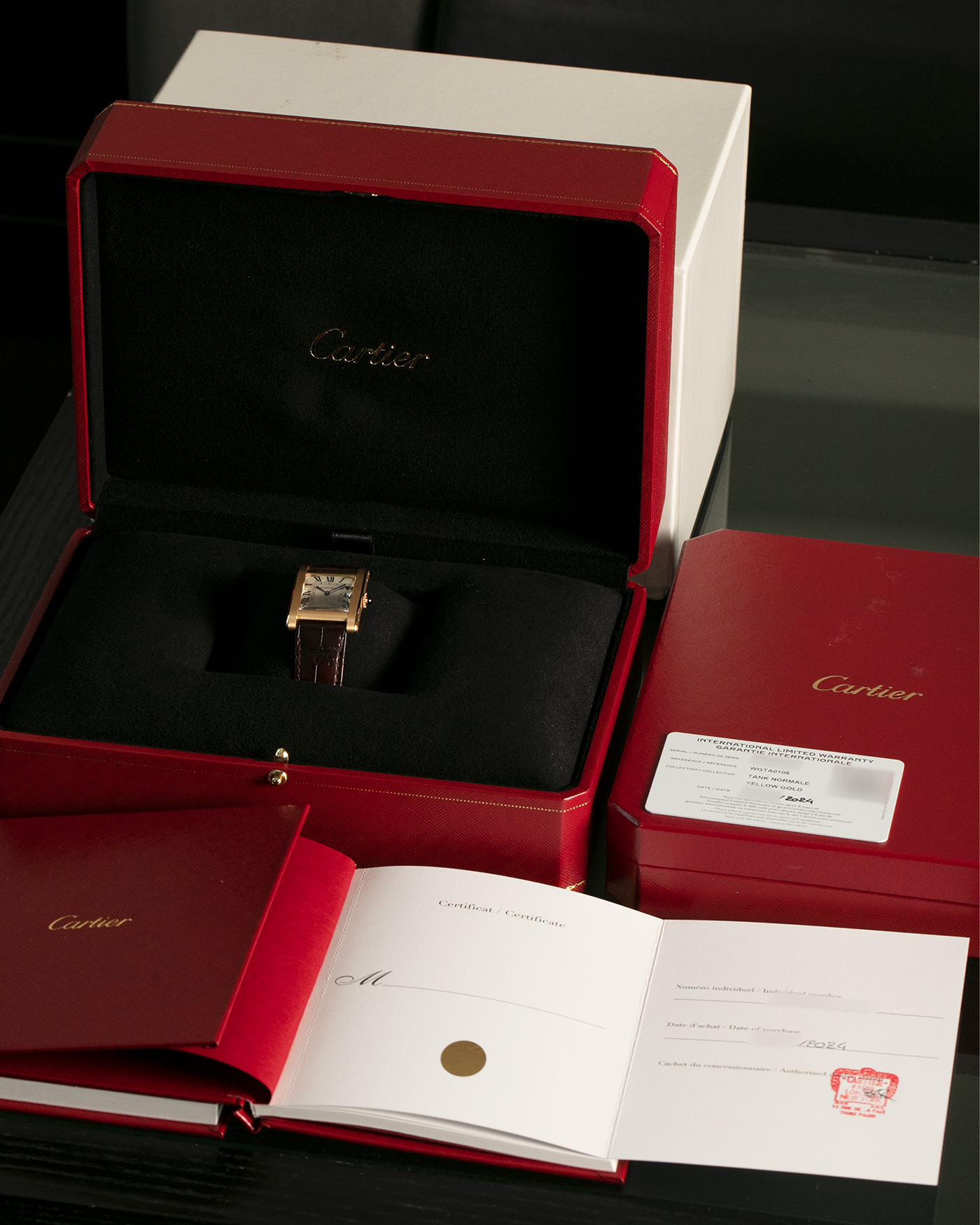 Brand: Cartier
Year: 2024
Model: Privé Tank Normale, Limited to 200 Pieces in this Combination
Reference Number: CRWGTA0108
Material: 18-carat Yellow Gold
Movement: Cartier Cal. 070 MC, Manual-Winding
Case Dimensions: 32.6mm (Lug-to-Lug) x 25.7mm
Lug Width: 19mm
Strap: Cartier Brown Alligator Leather Strap with Signed 18-carat Yellow Gold Tang Buckle