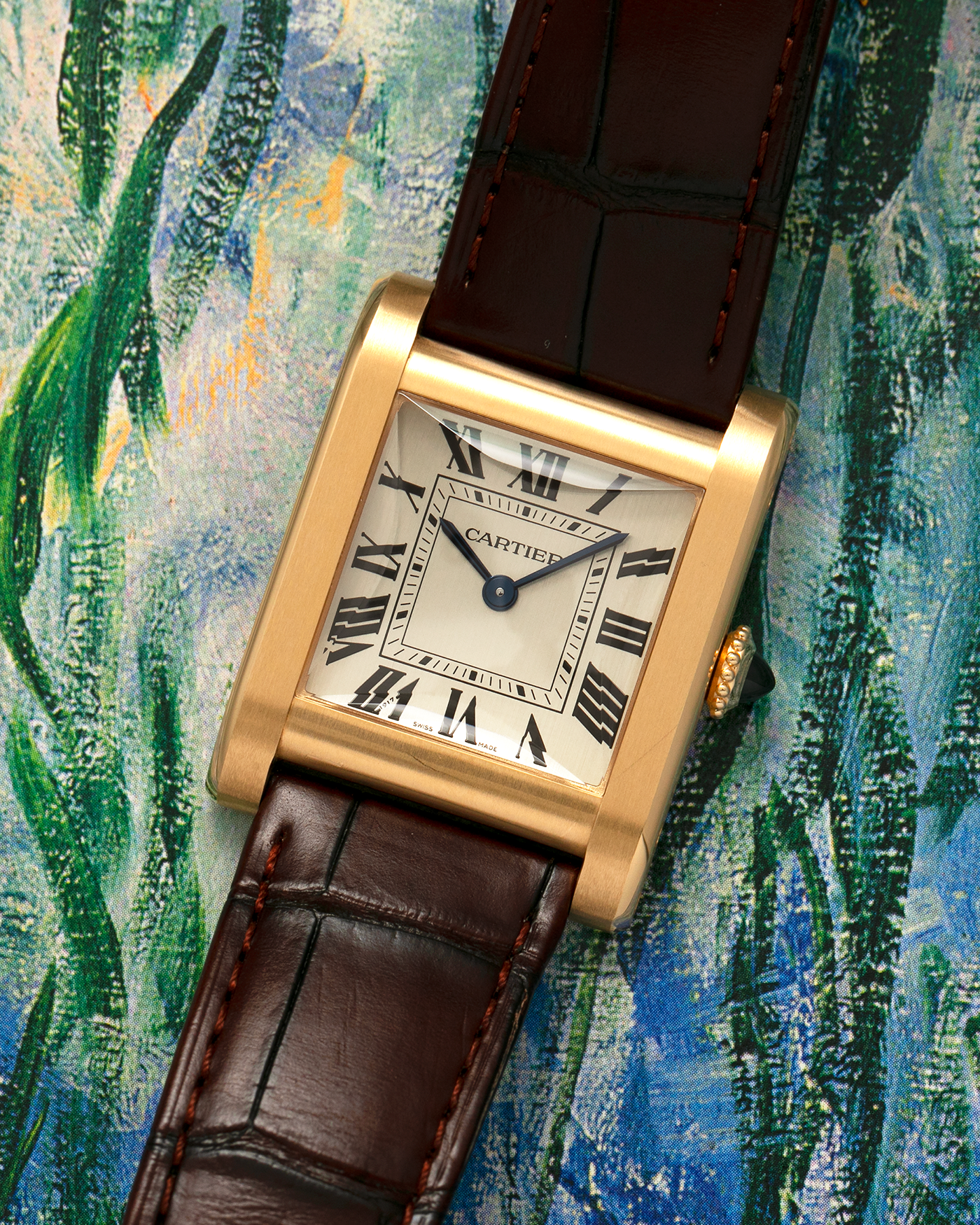 Brand: Cartier Year: 2023 Model: Privé Tank Normale, Limited to 200 Pieces in this Combination Reference Number: CRWGTA0108 Material: 18-carat Yellow Gold Movement: Cartier Cal. 070 MC, Manual-Winding Case Dimensions: 32.6mm x 25.7mm Lug Width: 19mm Strap: Cartier Brown Alligator Leather Strap with Signed 18-carat Yellow Gold Tang Buckle