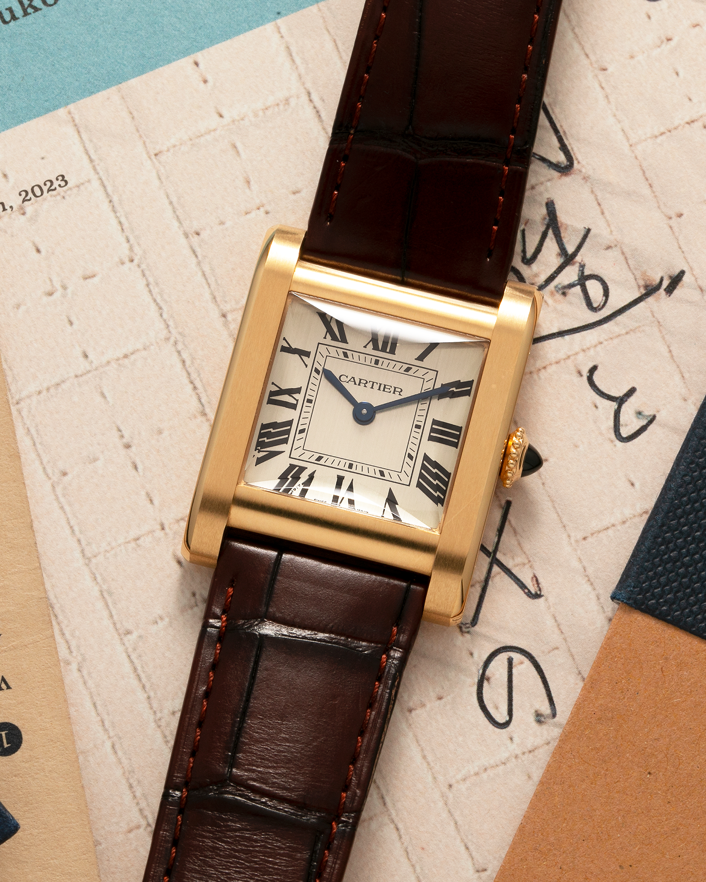 Brand: Cartier Year: 2023 Model: Privé Tank Normale, Limited to 200 Pieces in this Combination Reference Number: CRWGTA0108 Material: 18-carat Yellow Gold Movement: Cartier Cal. 070 MC, Manual-Winding Case Dimensions: 32.6mm x 25.7mm Lug Width: 19mm Strap: Cartier Brown Alligator Leather Strap with Signed 18-carat Yellow Gold Tang Buckle