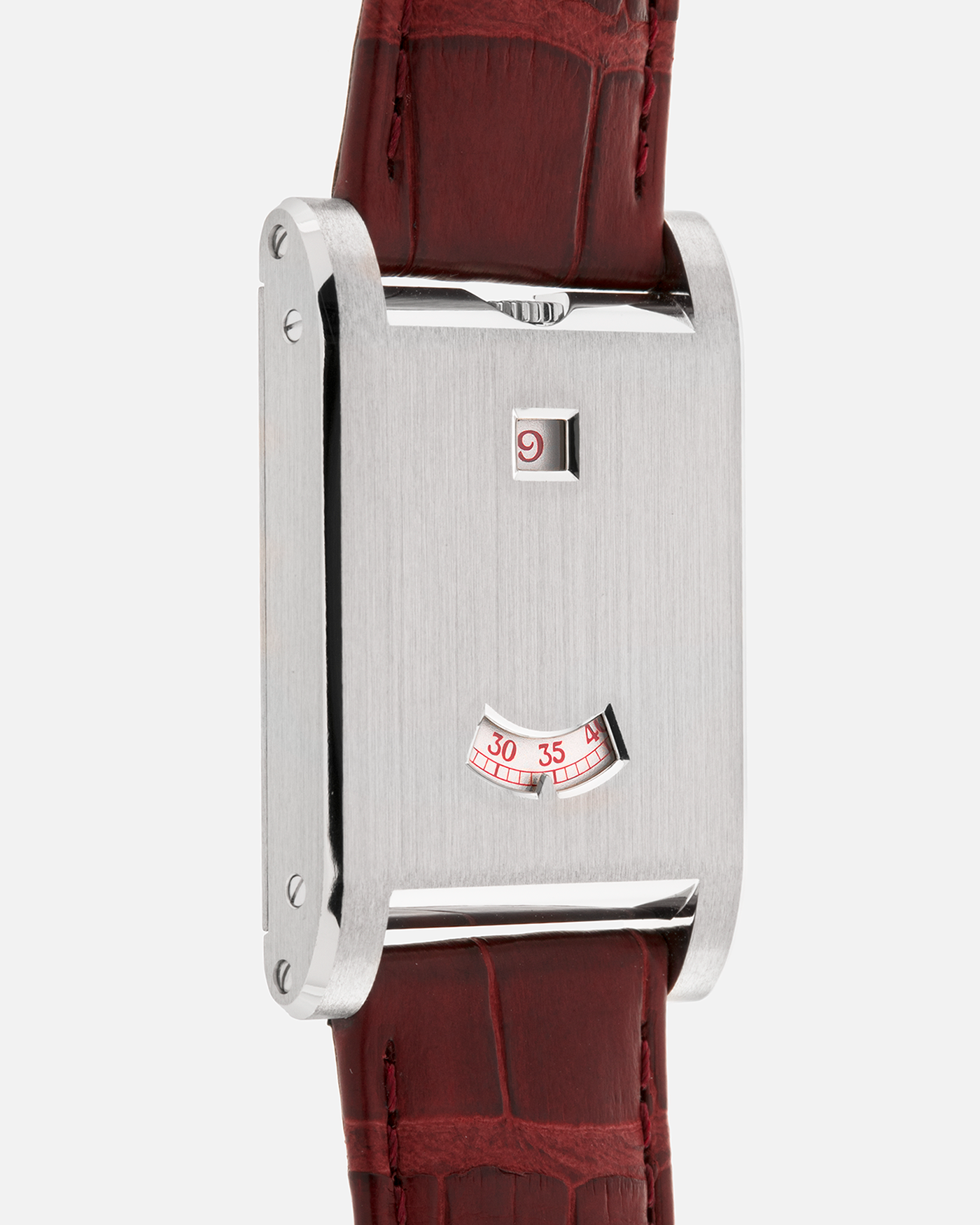 Brand: Cartier
Year: 2026
Model: Privé Tank à Guichets
Reference Number: 4124
Model Number: WGTA0027
Material: Platinum
Movement: Cartier Cal. 9755 MC (Based on Piaget Cal. 430P), Manual-Winding
Case Dimensions: 37.6mm Length 24.8mm Width 6mm Thickness
Lug Width: 18mm
Strap: Cartier Burgundy Alligator Leather Strap with Signed Platinum Tang Buckle