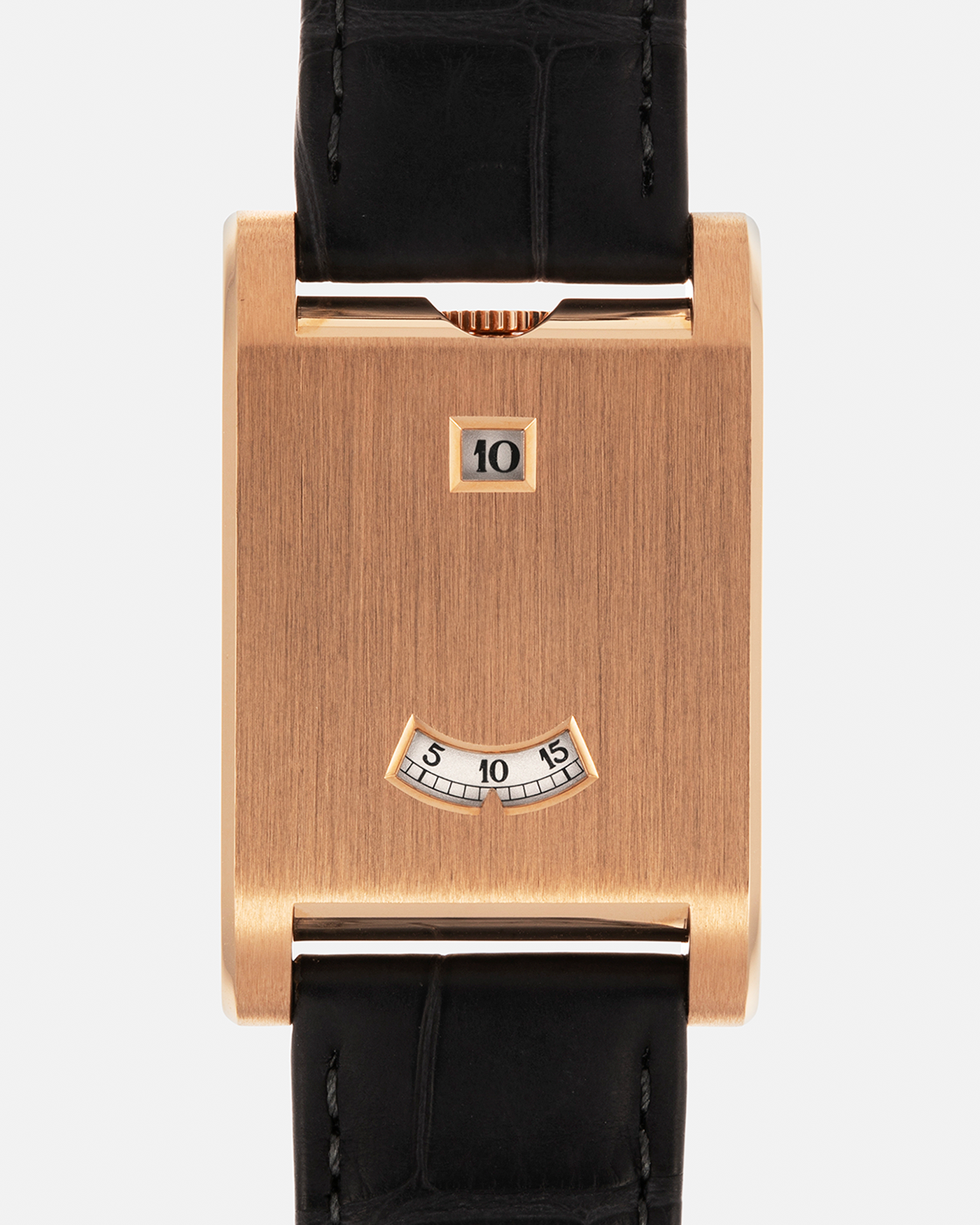 Brand: Cartier
Year: 2025
Model: Privé Tank à Guichets
Reference Number: 4581
Model Number: WGTA0235
Material: 18-carat Rose Gold
Movement: Cartier Cal. 9755 MC (Based on Piaget Cal. 430P), Manual-Winding
Case Dimensions: 37.6mm (Including Lugs) x 24.8mm x 6mm
Lug Width: 18mm
Strap: Cartier Dark Grey Alligator Leather Strap with Signed 18-carat Rose Gold Tang Buckle