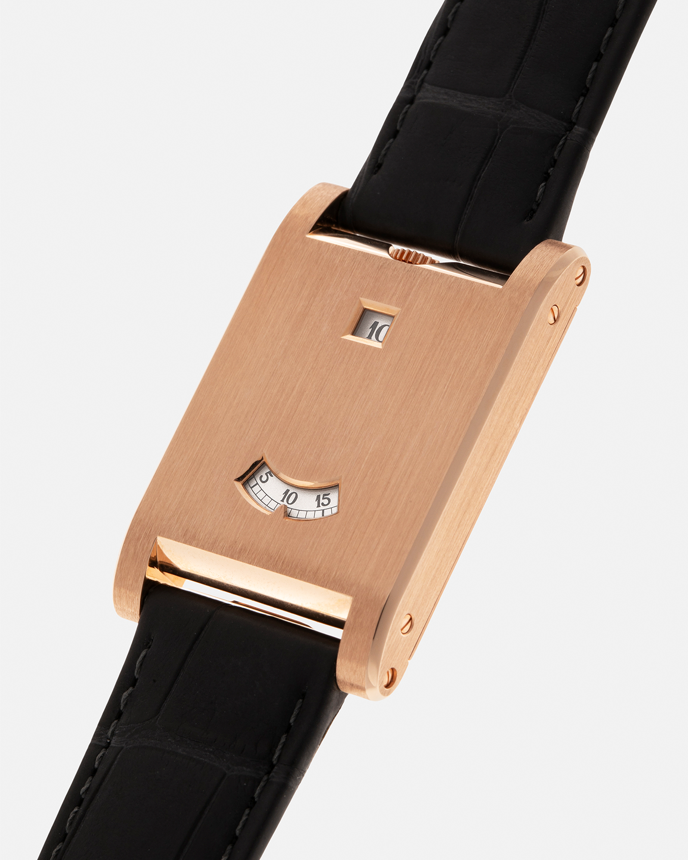 Brand: Cartier
Year: 2025
Model: Privé Tank à Guichets
Reference Number: 4581
Model Number: WGTA0235
Material: 18-carat Rose Gold
Movement: Cartier Cal. 9755 MC (Based on Piaget Cal. 430P), Manual-Winding
Case Dimensions: 37.6mm (Including Lugs) x 24.8mm x 6mm
Lug Width: 18mm
Strap: Cartier Dark Grey Alligator Leather Strap with Signed 18-carat Rose Gold Tang Buckle