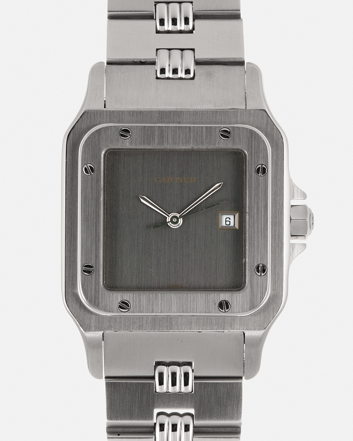 Brand: Cartier Year: 1980s Model: Santos ‘Carrée’ Reference: 2960 Material: Stainless Steel Movement: Cartier Cal. 077 (ETA Cal. 3671 Based), Self-Winding Case Dimensions: 29mm x 40.5mm Lug Width: 18mm Strap: Cartier Stainless Steel Godron ‘541811’ Bracelet with Signed Clasp