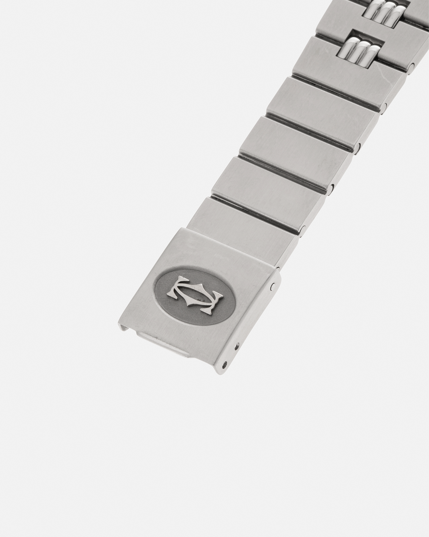 Brand: Cartier Year: 1980s Model: Santos ‘Carrée’ Reference: 2960 Material: Stainless Steel Movement: Cartier Cal. 077 (ETA Cal. 3671 Based), Self-Winding Case Dimensions: 29mm x 40.5mm Lug Width: 18mm Strap: Cartier Stainless Steel Godron ‘541811’ Bracelet with Signed Clasp