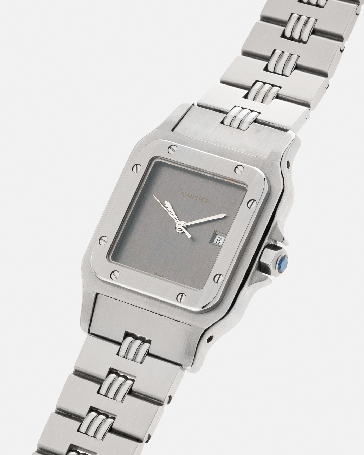 Brand: Cartier Year: 1980s Model: Santos ‘Carrée’ Reference: 2960 Material: Stainless Steel Movement: Cartier Cal. 077 (ETA Cal. 3671 Based), Self-Winding Case Dimensions: 29mm x 40.5mm Lug Width: 18mm Strap: Cartier Stainless Steel Godron ‘541811’ Bracelet with Signed Clasp