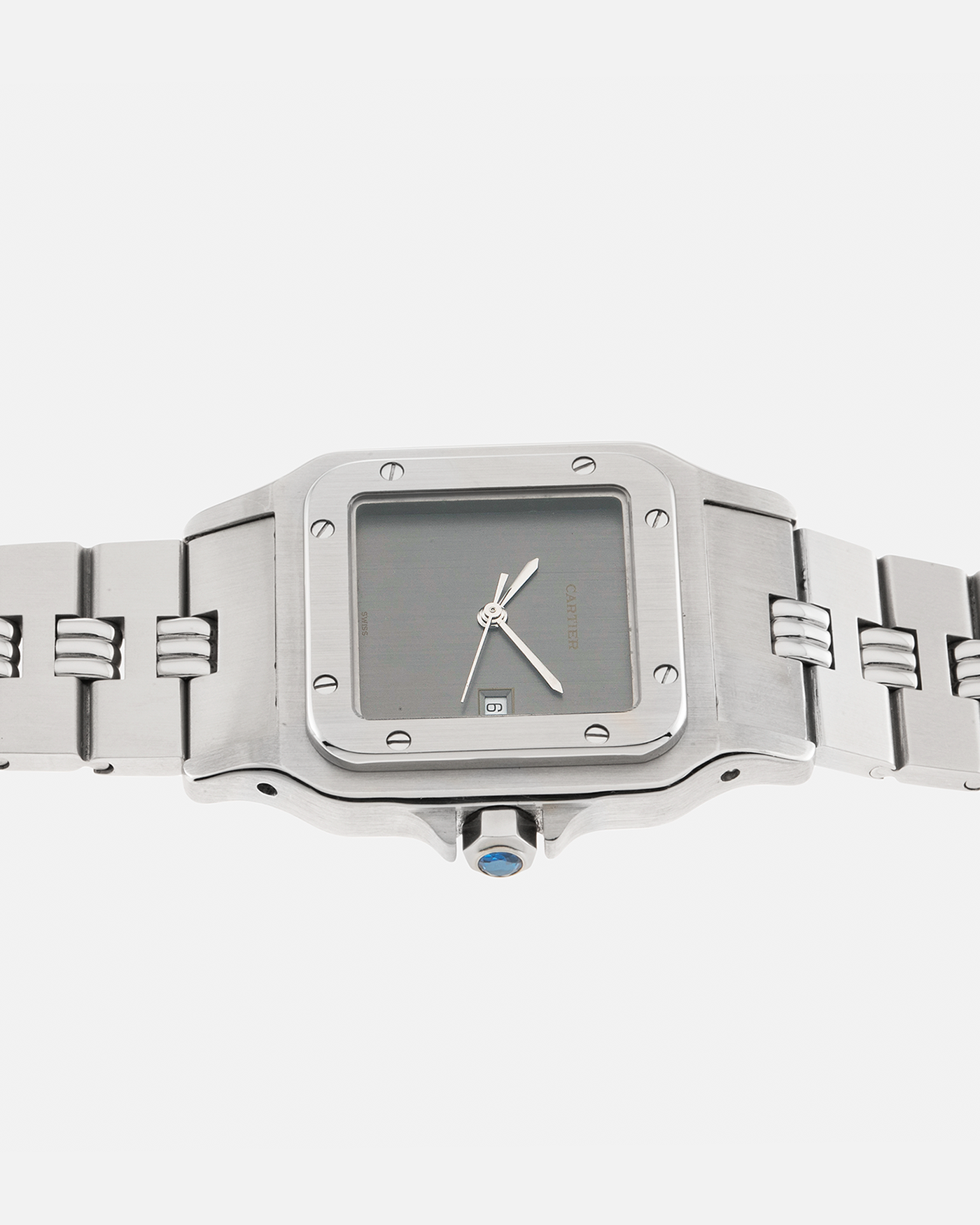 Brand: Cartier Year: 1980s Model: Santos ‘Carrée’ Reference: 2960 Material: Stainless Steel Movement: Cartier Cal. 077 (ETA Cal. 3671 Based), Self-Winding Case Dimensions: 29mm x 40.5mm Lug Width: 18mm Strap: Cartier Stainless Steel Godron ‘541811’ Bracelet with Signed Clasp