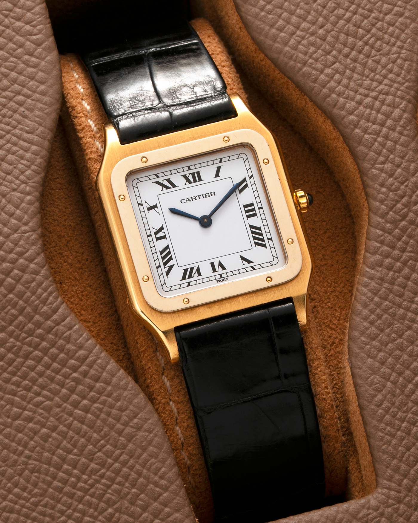 Brand: Cartier Year: 1980s Model: Santos Dumont Reference: 1575 Material: 18-carat Yellow Gold Movement: Frédéric Piguet based Cal. 021 MC, Manual-Winding Case Diameter: 27mm x 36mm Strap: Cartier Black Leather Strap with Signed 18-carat Yellow Gold Tang Buckle