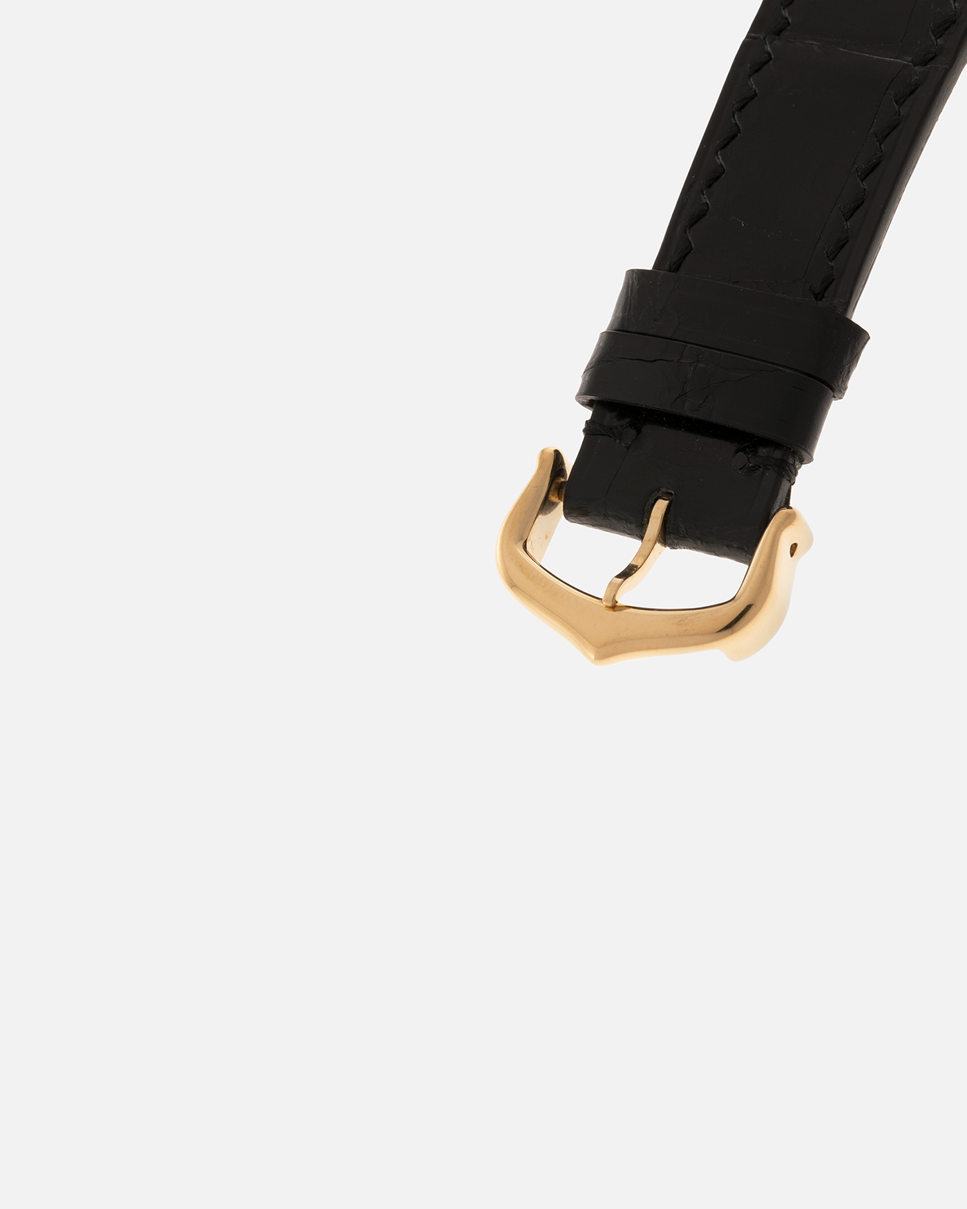 Brand: Cartier
Year: 1990s
Model: Santos Dumont
Reference: 1576
Material: 18-carat Yellow Gold
Movement: Cartier Cal. 021MC (Based on Frédéric Piguet 21 ébauche), Manual-Winding
Case Dimensions: 27mm x 6.5mm (Lug-to-Lug 36mm)
Lug Width: 17mm
Strap: Generic Unnamed Black Calf Leather Strap with Cartier Style Gold Plated Tang Buckle, Cartier Black Alligator Leather Strap