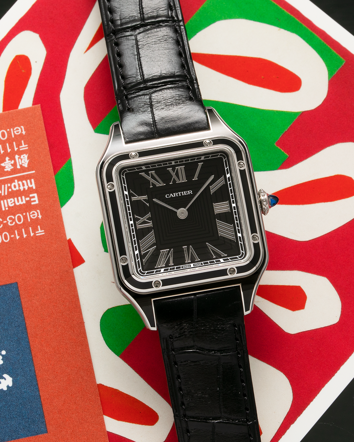 Brand: Cartier Year: 2023 Model: Santos-Dumont Large Reference: CRWSSA0046 Material: Stainless Steel, Black Lacquer Movement: Cartier Cal. 430 MC, Manual-Winding Case Diameter: 43.5mm x 31.4mm Strap: Cartier Black Alligator Leather Strap with Signed Stainless Steel Tang Buckle
