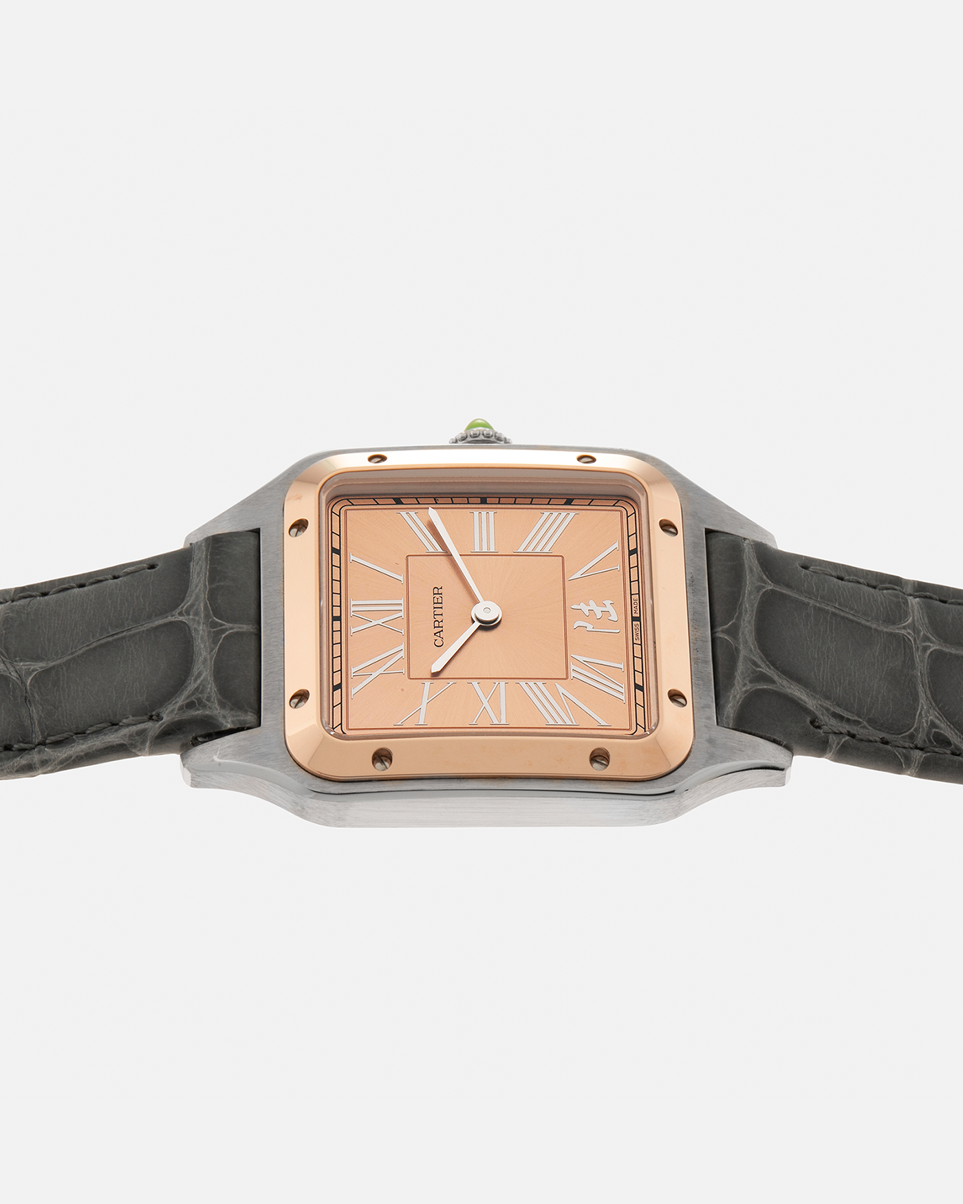 Brand: Cartier Year: 2022 Model: Santos-Dumont ‘China’, Limited Edition of 300 pieces Reference Number: W2SA0027 Material: Stainless Steel Case and 18-carat Rose Gold Bezel Movement: Cartier Cal. 430 MC, Manual-Winding Case Dimensions: 43.5mm x 31.4mm Lud Width: 18mm Strap: Cartier Anthracite Grey Alligator Leather Strap with Signed Stainless Steel Tang Buckle
