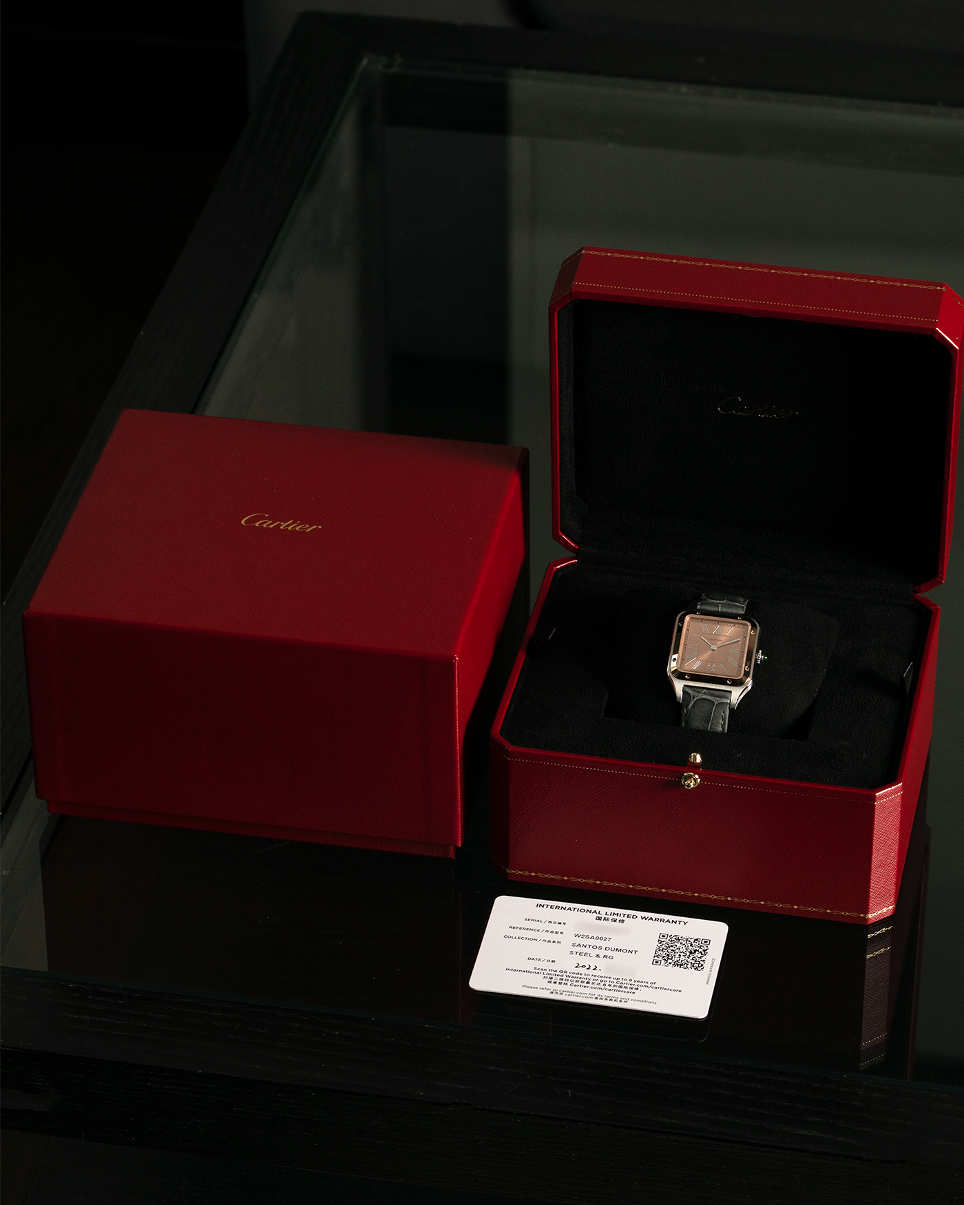 Brand: Cartier Year: 2022 Model: Santos-Dumont ‘China’, Limited Edition of 300 pieces Reference Number: W2SA0027 Material: Stainless Steel Case and 18-carat Rose Gold Bezel Movement: Cartier Cal. 430 MC, Manual-Winding Case Dimensions: 43.5mm x 31.4mm Lud Width: 18mm Strap: Cartier Anthracite Grey Alligator Leather Strap with Signed Stainless Steel Tang Buckle