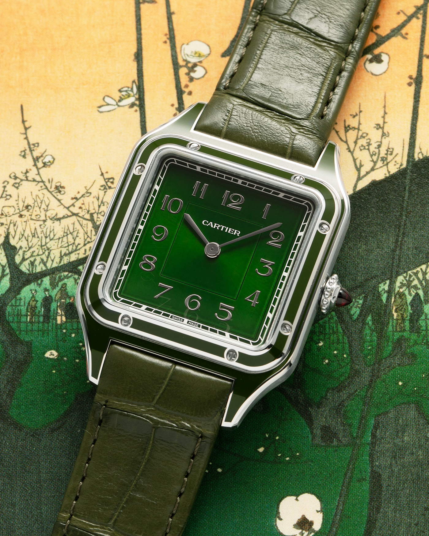 Brand: Cartier
Year: 2025
Model: Santos-Dumont Large, Limited Edition of 200 Pieces
Reference: WGSA0096
Material: Platinum 950, Green Lacquer
Movement: Cartier Cal. 430 MC, Manual-Winding
Case Dimensions: 43.5mm (Including Lugs) x 31.4mm
Strap: Cartier Olive Green  Alligator Leather Strap with Platinum Cartier Tang Buckle