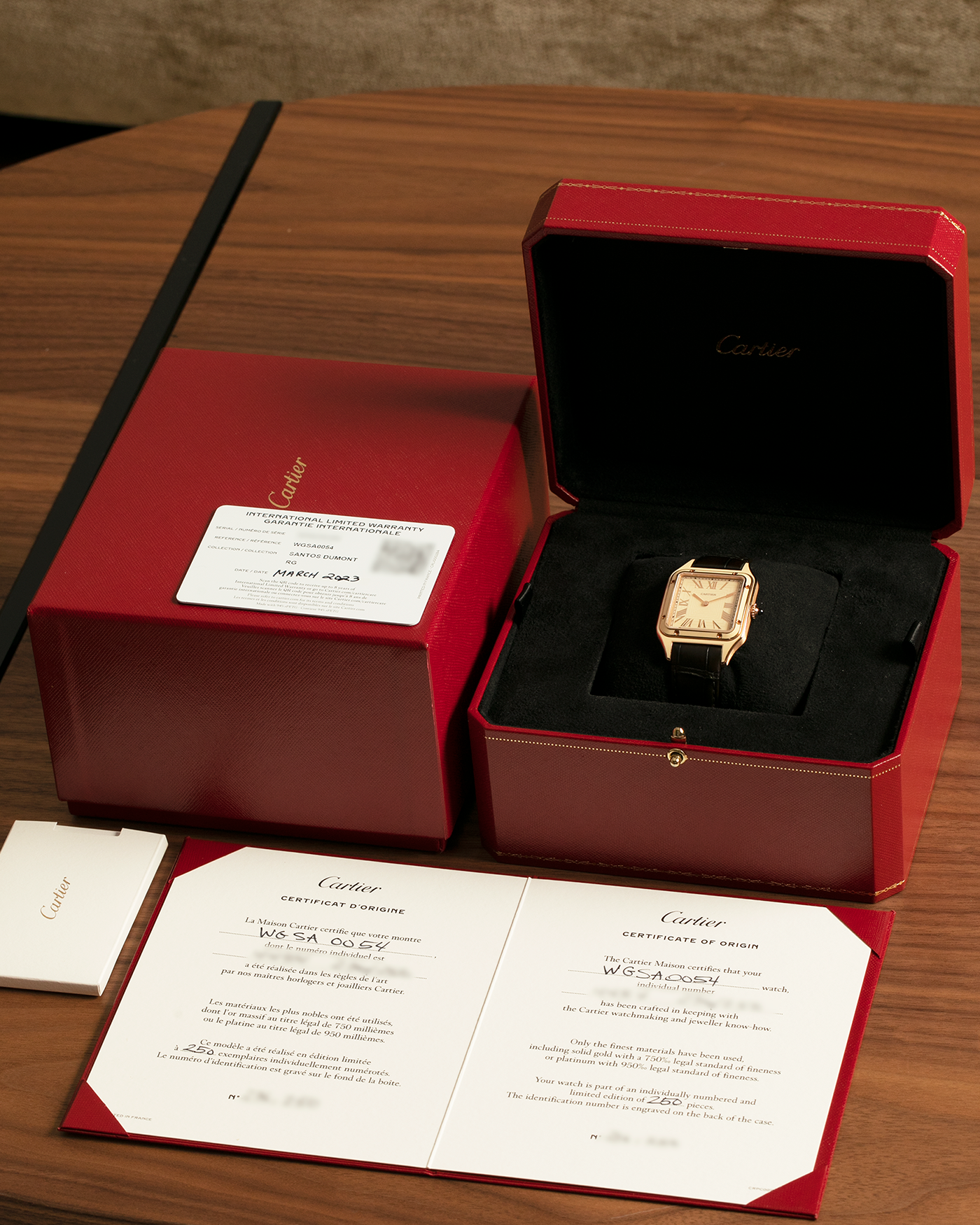 Brand: Cartier Year: 2023 Model: Santos-Dumont Lacquered “Large” Reference: WGSA0054 Material: 18-carat Rose Gold, Beige Lacquer Movement: Cartier Cal. 430 MC, Manual-Winding Case Dimensions: 43.5mm (Including Lugs) x 31.4mm x 7.3mm Strap: Cartier Olive Green Alligator Leather Strap with Signed 18-carat Rose Gold Tang Buckle