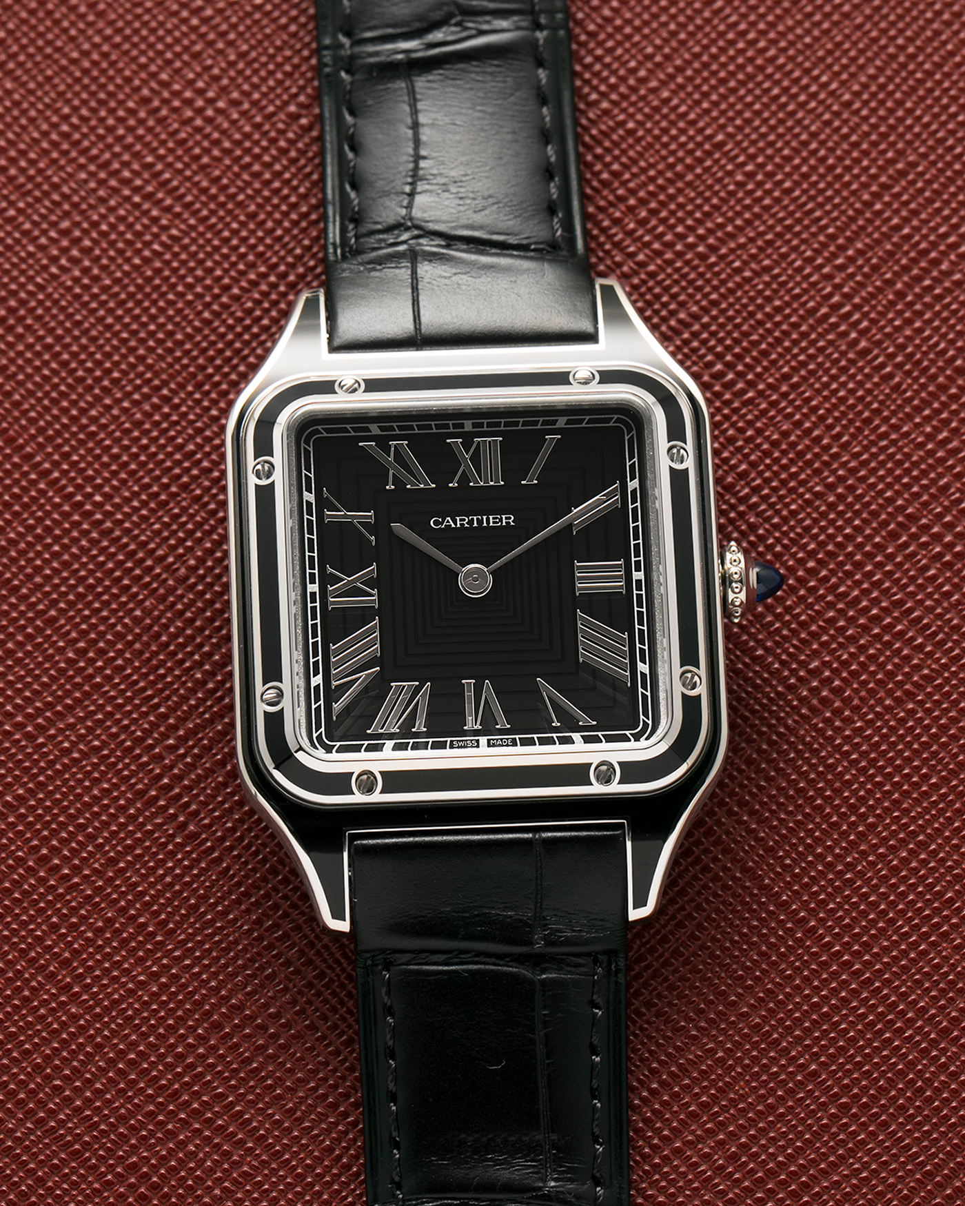 Brand: Cartier
Year: 2025
Model: Santos-Dumont Large ‘Lacquered’
Reference: CRWSSA0046
Material: Stainless Steel, Black Lacquer
Movement: Cartier Cal. 430 MC, Manual-Winding
Case Dimensions: 43.5mm (Including Lugs) x 31.4mm
Strap: Cartier Black Alligator Leather Strap with Signed Stainless Steel Tang Buckle