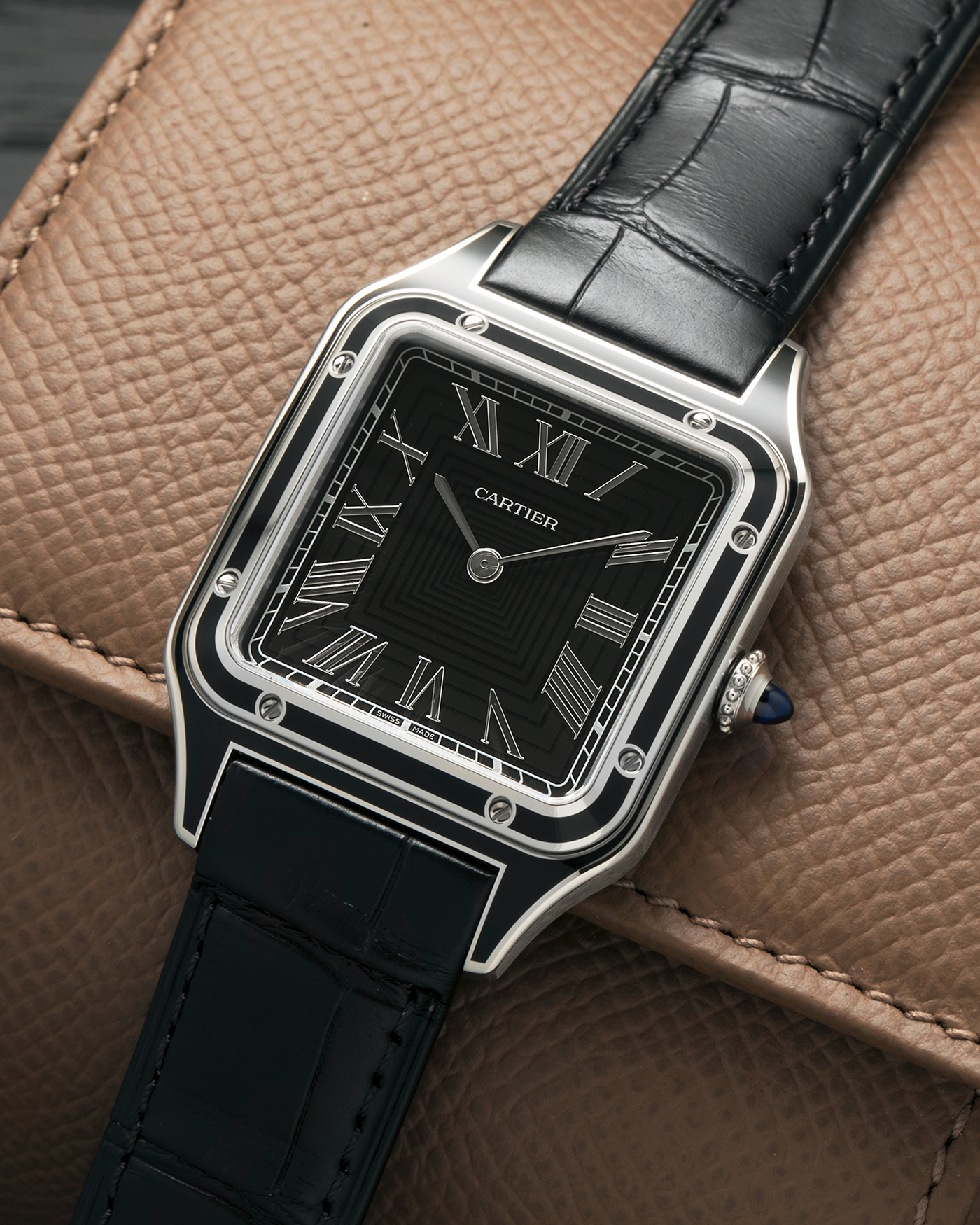 Brand: Cartier
Year: 2025
Model: Santos-Dumont Large ‘Lacquered’
Reference: CRWSSA0046
Material: Stainless Steel, Black Lacquer
Movement: Cartier Cal. 430 MC, Manual-Winding
Case Dimensions: 43.5mm (Including Lugs) x 31.4mm
Strap: Cartier Black Alligator Leather Strap with Signed Stainless Steel Tang Buckle