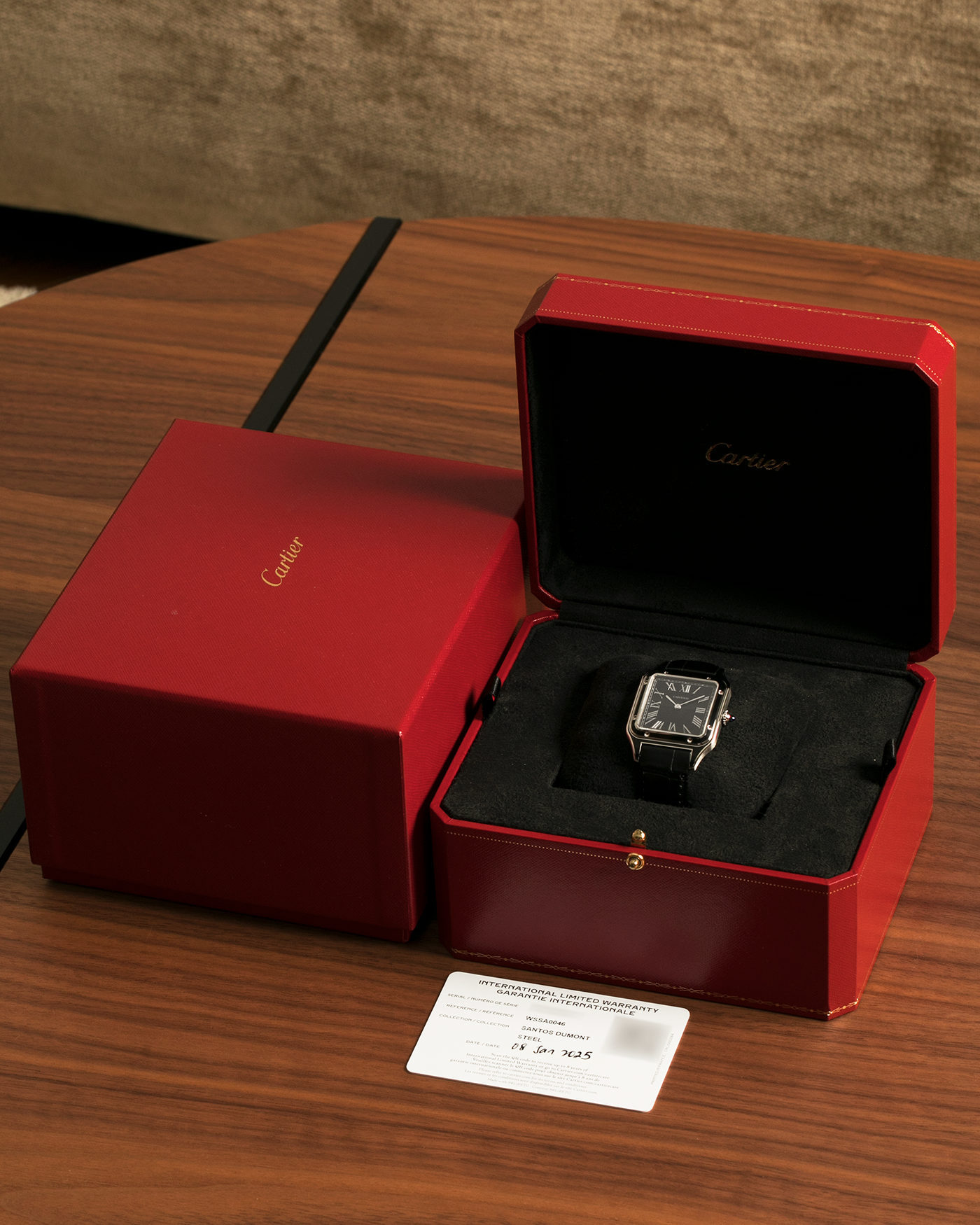 Brand: Cartier
Year: 2025
Model: Santos-Dumont Large ‘Lacquered’
Reference: CRWSSA0046
Material: Stainless Steel, Black Lacquer
Movement: Cartier Cal. 430 MC, Manual-Winding
Case Dimensions: 43.5mm (Including Lugs) x 31.4mm
Strap: Cartier Black Alligator Leather Strap with Signed Stainless Steel Tang Buckle