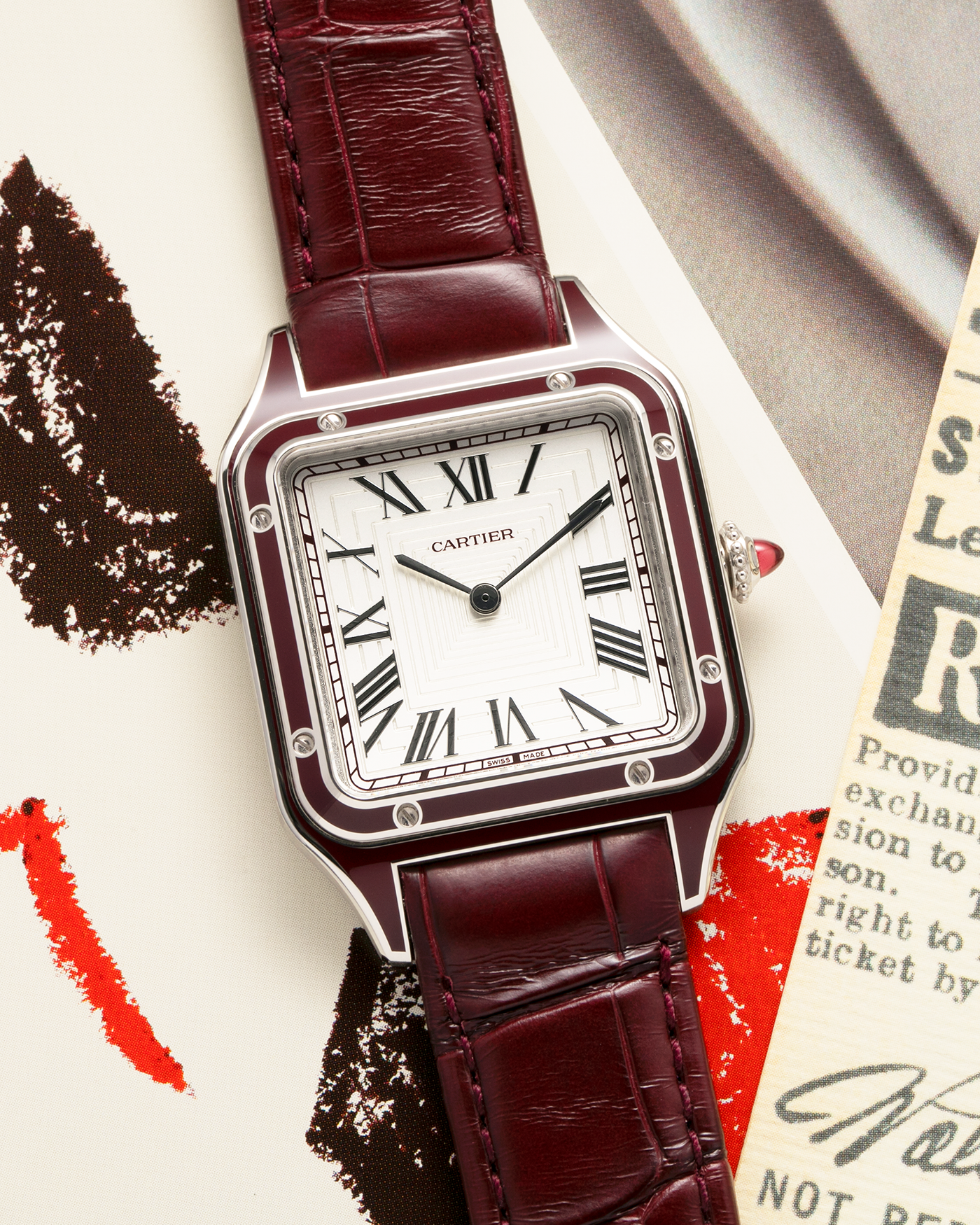 Brand: Cartier
Year: 2022
Model: Santos-Dumont Large, Limited Edition of 150 pieces
Material: Platinum 950, Burgundy Lacquer
Movement: Cartier Cal. 430 MC, Manual-Winding
Case Dimensions: 43.5mm (Including Lugs) x 31.4mm
Strap: Cartier Burgundy Alligator Leather Strap with Signed Platinum 950 Tang Buckle