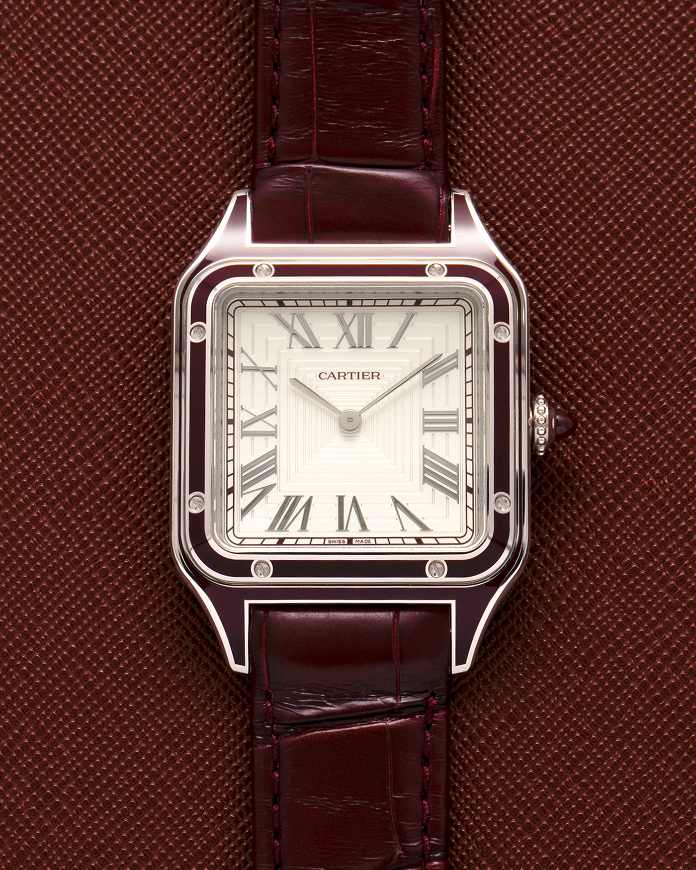 Brand: Cartier
Year: 2022
Model: Santos-Dumont Large, Limited Edition of 150 pieces
Material: Platinum 950, Burgundy Lacquer
Movement: Cartier Cal. 430 MC, Manual-Winding
Case Dimensions: 43.5mm (Including Lugs) x 31.4mm
Strap: Cartier Burgundy Alligator Leather Strap with Signed Platinum 950 Tang Buckle