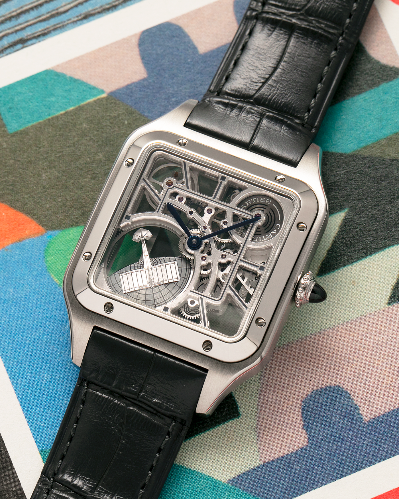 Brand: Cartier
Year: 2023
Model: Santos Dumont Skeleton Micro-Rotor
Reference: CRWHSA0032
Material: Stainless Steel
Movement: Cartier Cal. 9629 MC, Self-Winding Micro-Rotor
Case Dimensions: 31.4mm x 43.5mm (Including Lugs)
Strap: Cartier Dark Navy Alligator Leather Strap with Signed Stainless Steel Tang Buckle
