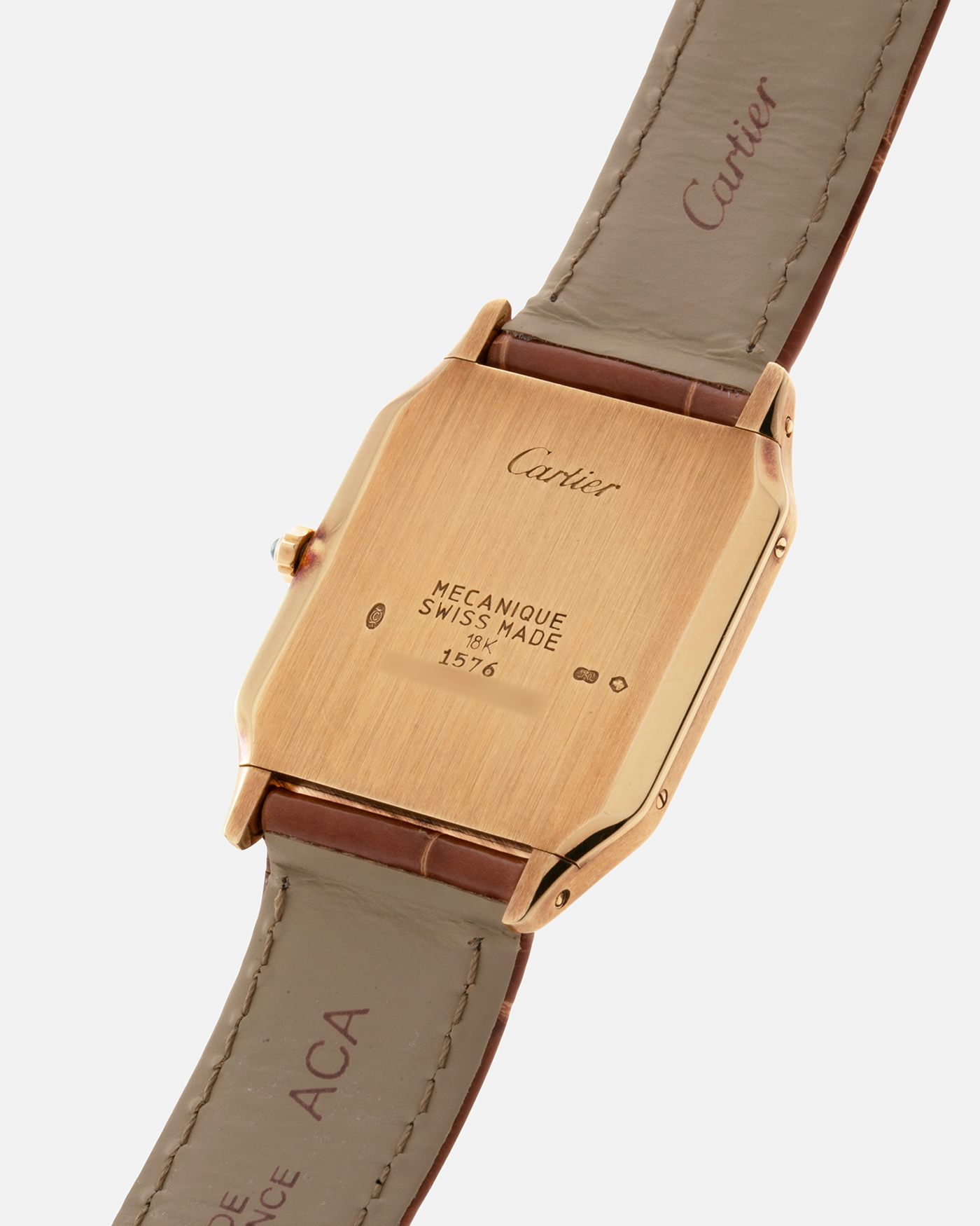 Brand: Cartier Year: 1990s Model: Santos-Dumont Reference: 1576 Material: 18-carat Yellow Gold Movement: Cartier Cal. 021 MC (Frédéric Piguet Cal. 21 based), Manual-Winding Case Diameter: 27mm Lug Width: 18mm Strap: Cartier Light Brown Alligator Leather Strap with Signed 18-carat Yellow Gold Tang Buckle