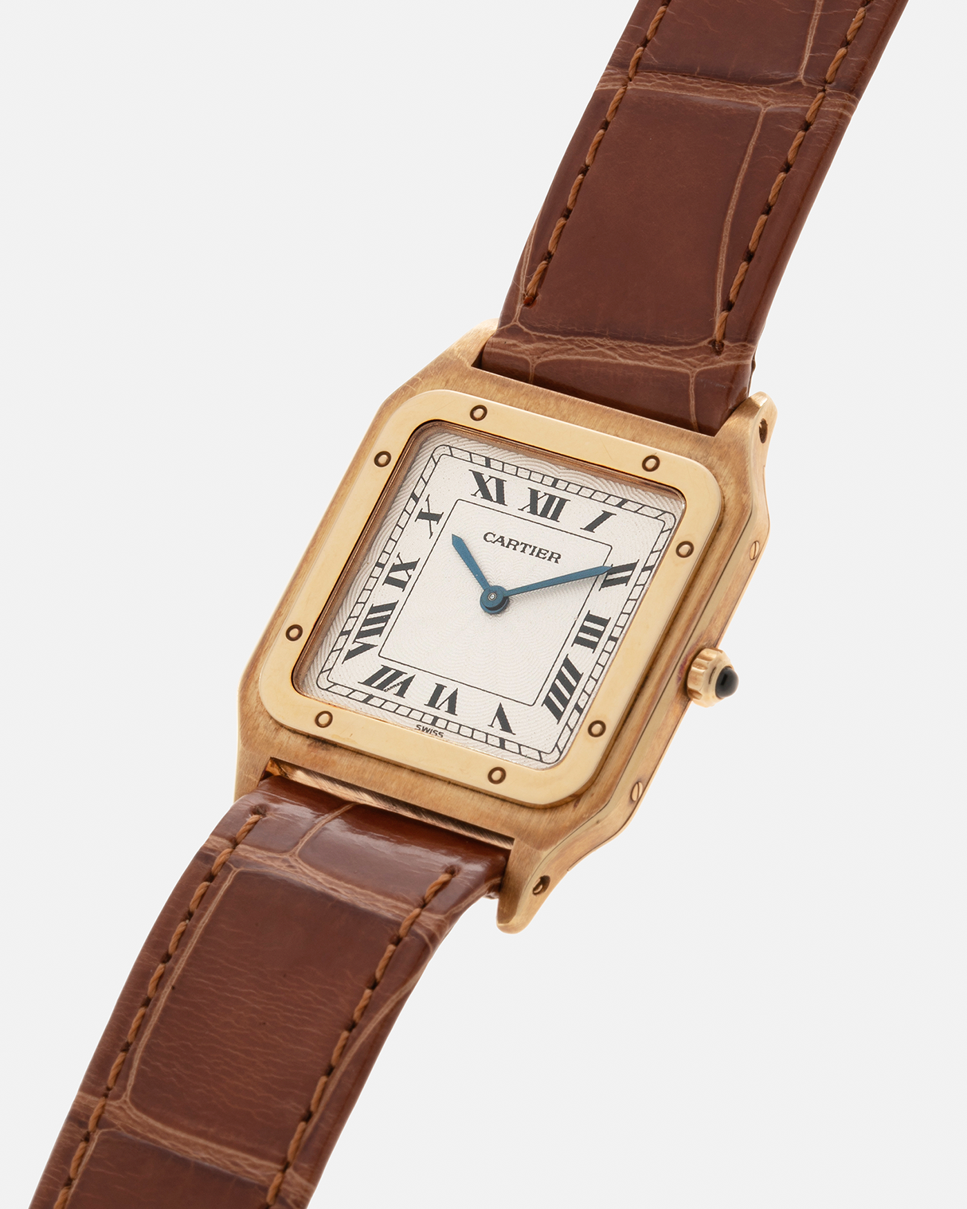Brand: Cartier Year: 1990s Model: Santos-Dumont Reference: 1576 Material: 18-carat Yellow Gold Movement: Cartier Cal. 021 MC (Frédéric Piguet Cal. 21 based), Manual-Winding Case Diameter: 27mm Lug Width: 18mm Strap: Cartier Light Brown Alligator Leather Strap with Signed 18-carat Yellow Gold Tang Buckle