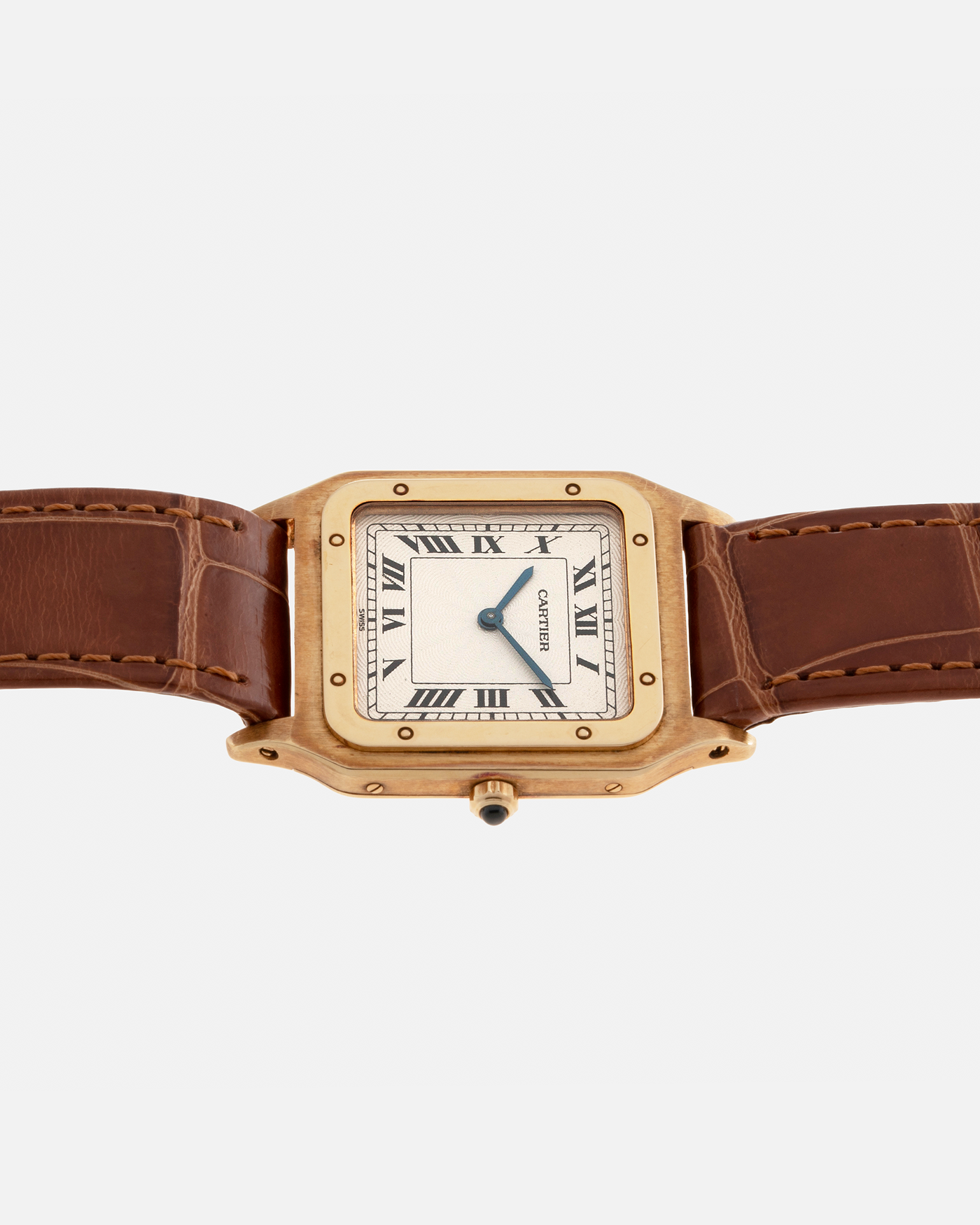 Brand: Cartier Year: 1990s Model: Santos-Dumont Reference: 1576 Material: 18-carat Yellow Gold Movement: Cartier Cal. 021 MC (Frédéric Piguet Cal. 21 based), Manual-Winding Case Diameter: 27mm Lug Width: 18mm Strap: Cartier Light Brown Alligator Leather Strap with Signed 18-carat Yellow Gold Tang Buckle