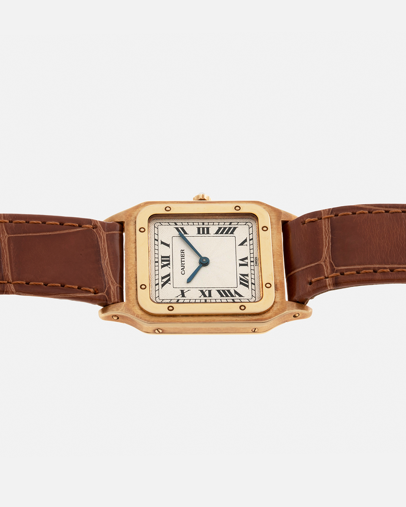 Brand: Cartier Year: 1990s Model: Santos-Dumont Reference: 1576 Material: 18-carat Yellow Gold Movement: Cartier Cal. 021 MC (Frédéric Piguet Cal. 21 based), Manual-Winding Case Diameter: 27mm Lug Width: 18mm Strap: Cartier Light Brown Alligator Leather Strap with Signed 18-carat Yellow Gold Tang Buckle