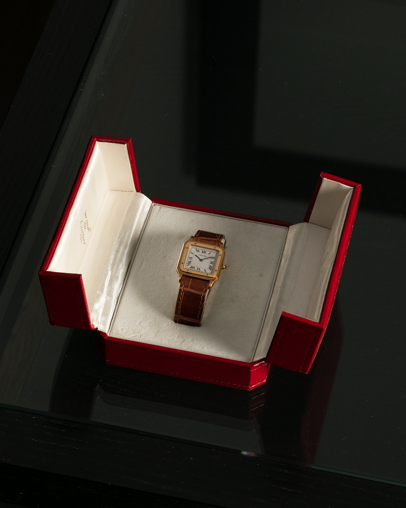 Brand: Cartier Year: 1990s Model: Santos-Dumont Reference: 1576 Material: 18-carat Yellow Gold Movement: Cartier Cal. 021 MC (Frédéric Piguet Cal. 21 based), Manual-Winding Case Diameter: 27mm Lug Width: 18mm Strap: Cartier Light Brown Alligator Leather Strap with Signed 18-carat Yellow Gold Tang Buckle