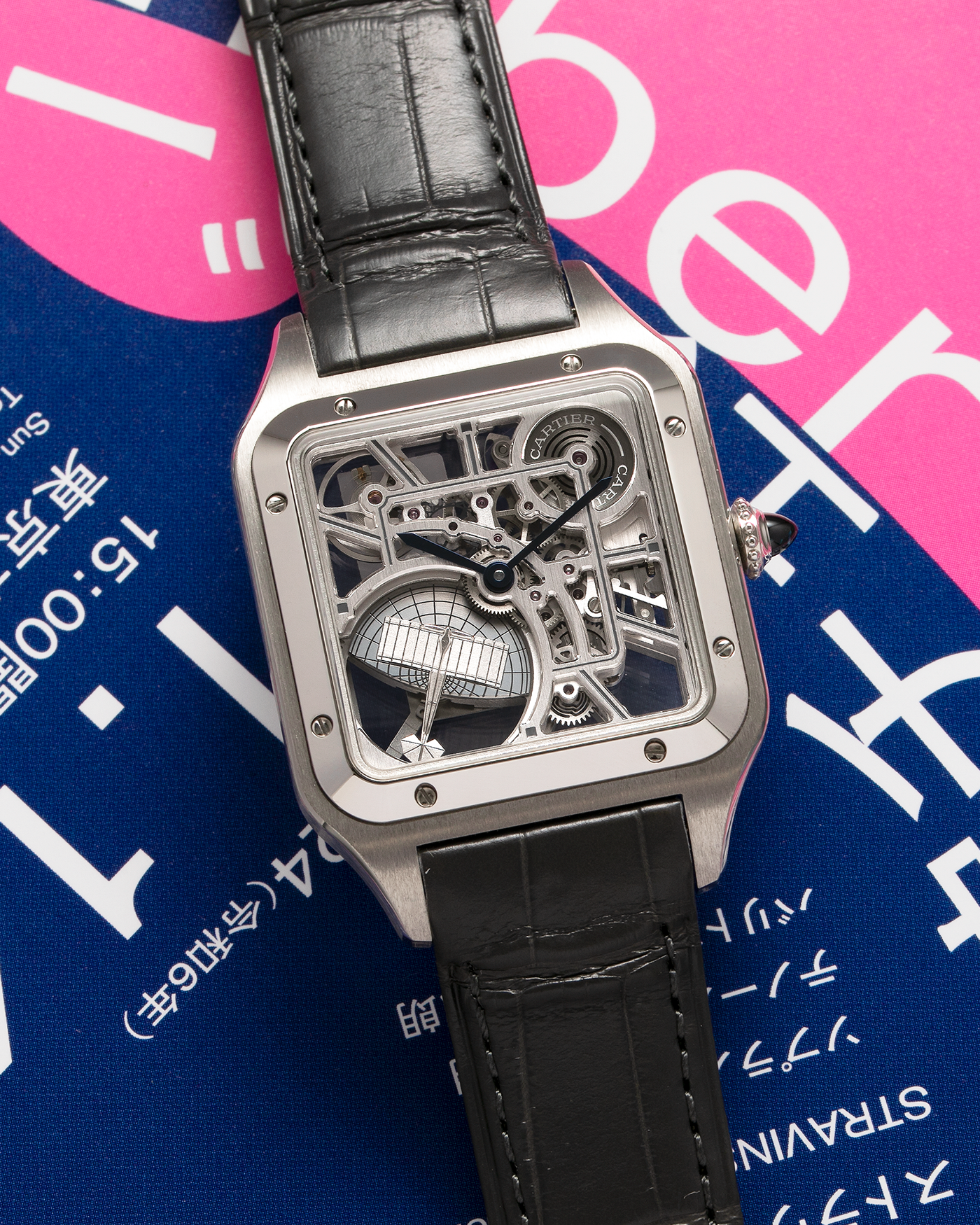 Brand: Cartier Year: 2023 Model: Santos Dumont Skeleton MicroRotor Reference: CRWHSA0032 Material: Stainless Steel Movement: Cartier Cal. 9629 MC, Self-Winding Micro-Rotor Case Diameter: 31.4mm x 43.5mm Strap: Cartier Grey Alligator Leather Strap with Signed Stainless Steel Ardillon Buckle