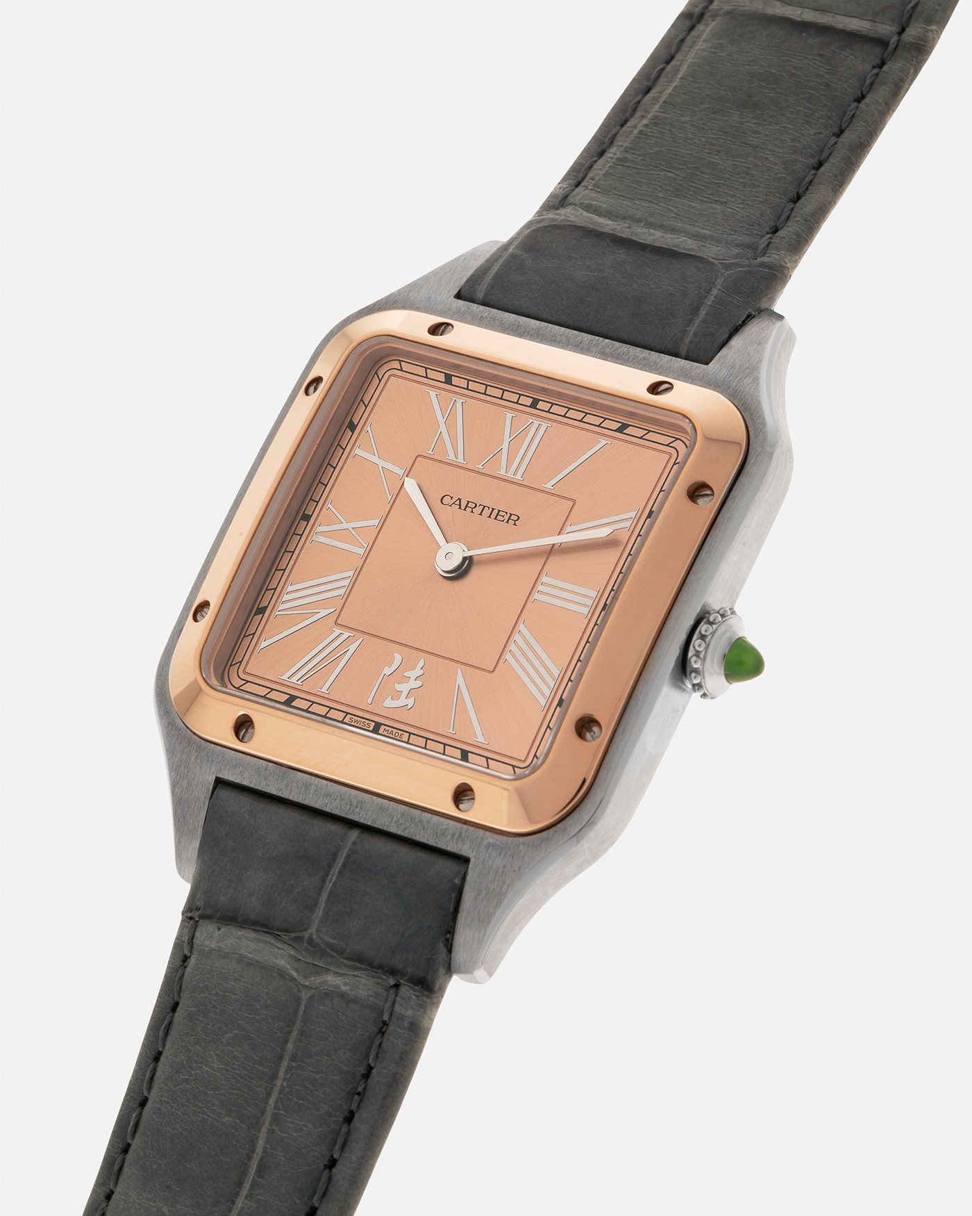 Brand: Cartier
Year: 2023
Model: Santos-Dumont ‘China’, Limited Edition of 300 pieces
Reference Number: W2SA0027
Material: Stainless Steel Case and 18-carat Rose Gold Bezel
Movement: Cartier Cal. 430 MC, Manual-Winding
Case Dimensions: 43.5mm (Including Lugs) x 31.4mm
Lug Width: 18mm
Strap: Cartier Anthracite Grey Alligator Leather Strap with Signed Stainless Steel Tang Buckle
