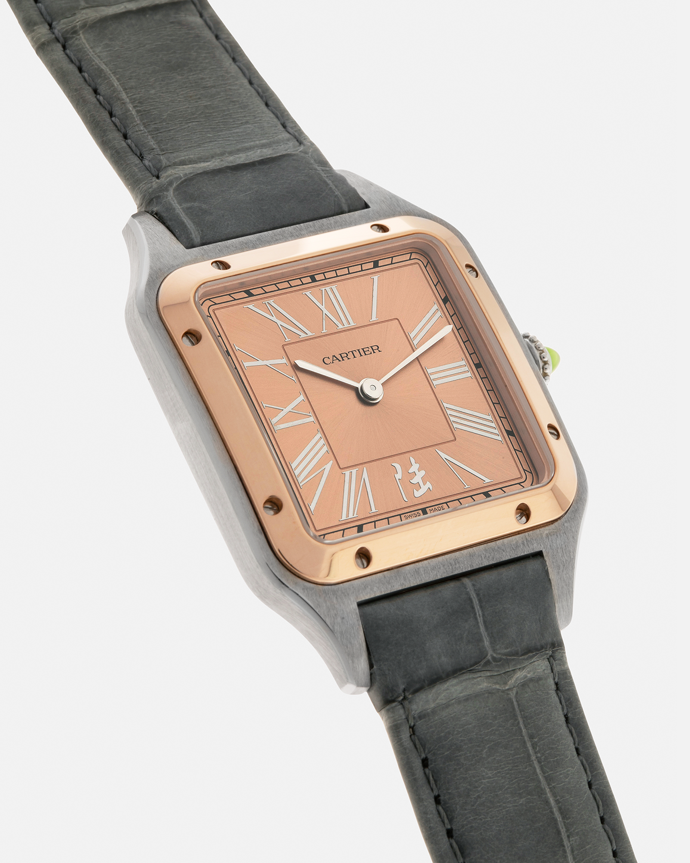 Brand: Cartier
Year: 2023
Model: Santos-Dumont ‘China’, Limited Edition of 300 pieces
Reference Number: W2SA0027
Material: Stainless Steel Case and 18-carat Rose Gold Bezel
Movement: Cartier Cal. 430 MC, Manual-Winding
Case Dimensions: 43.5mm (Including Lugs) x 31.4mm
Lug Width: 18mm
Strap: Cartier Anthracite Grey Alligator Leather Strap with Signed Stainless Steel Tang Buckle