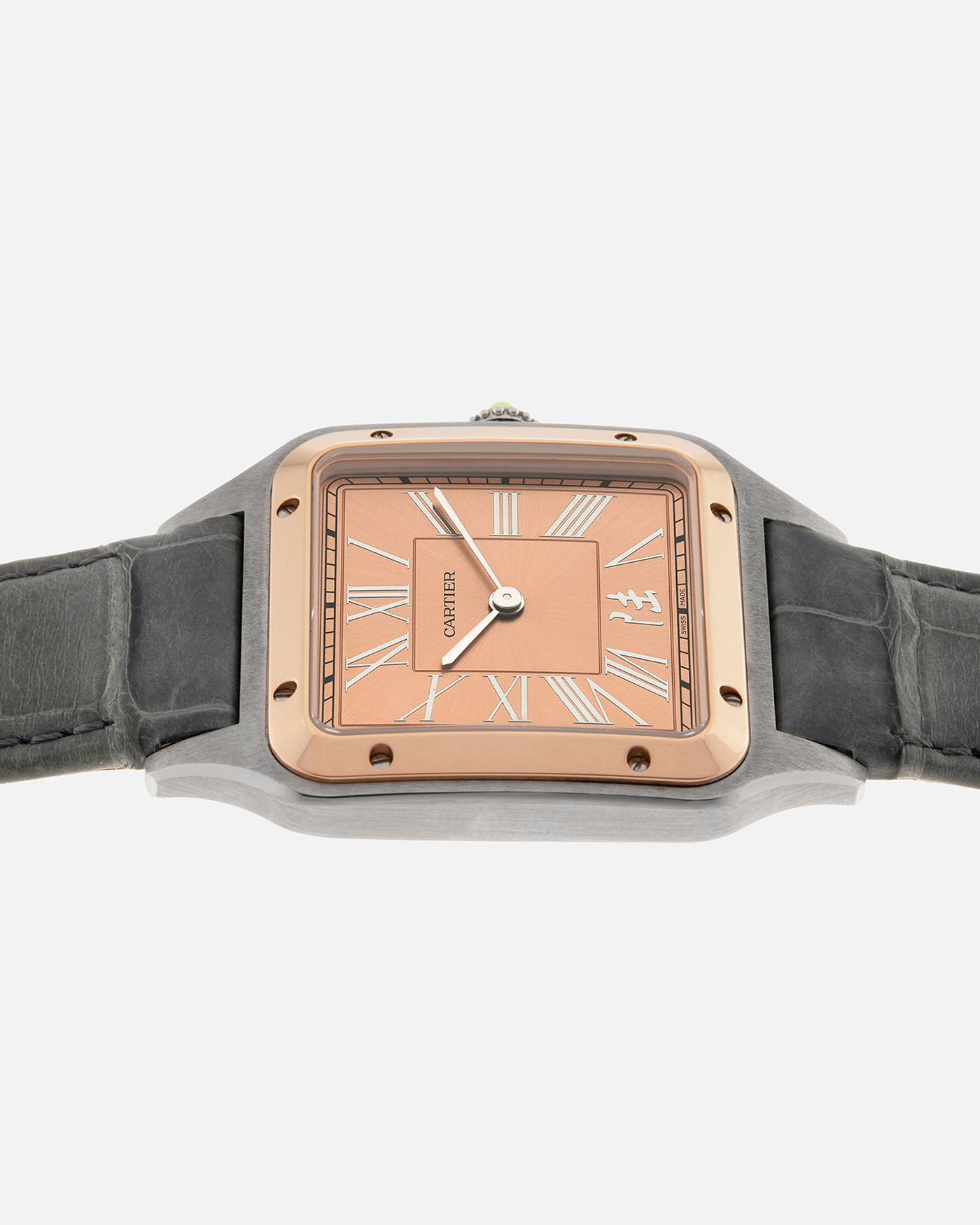 Brand: Cartier
Year: 2023
Model: Santos-Dumont ‘China’, Limited Edition of 300 pieces
Reference Number: W2SA0027
Material: Stainless Steel Case and 18-carat Rose Gold Bezel
Movement: Cartier Cal. 430 MC, Manual-Winding
Case Dimensions: 43.5mm (Including Lugs) x 31.4mm
Lug Width: 18mm
Strap: Cartier Anthracite Grey Alligator Leather Strap with Signed Stainless Steel Tang Buckle