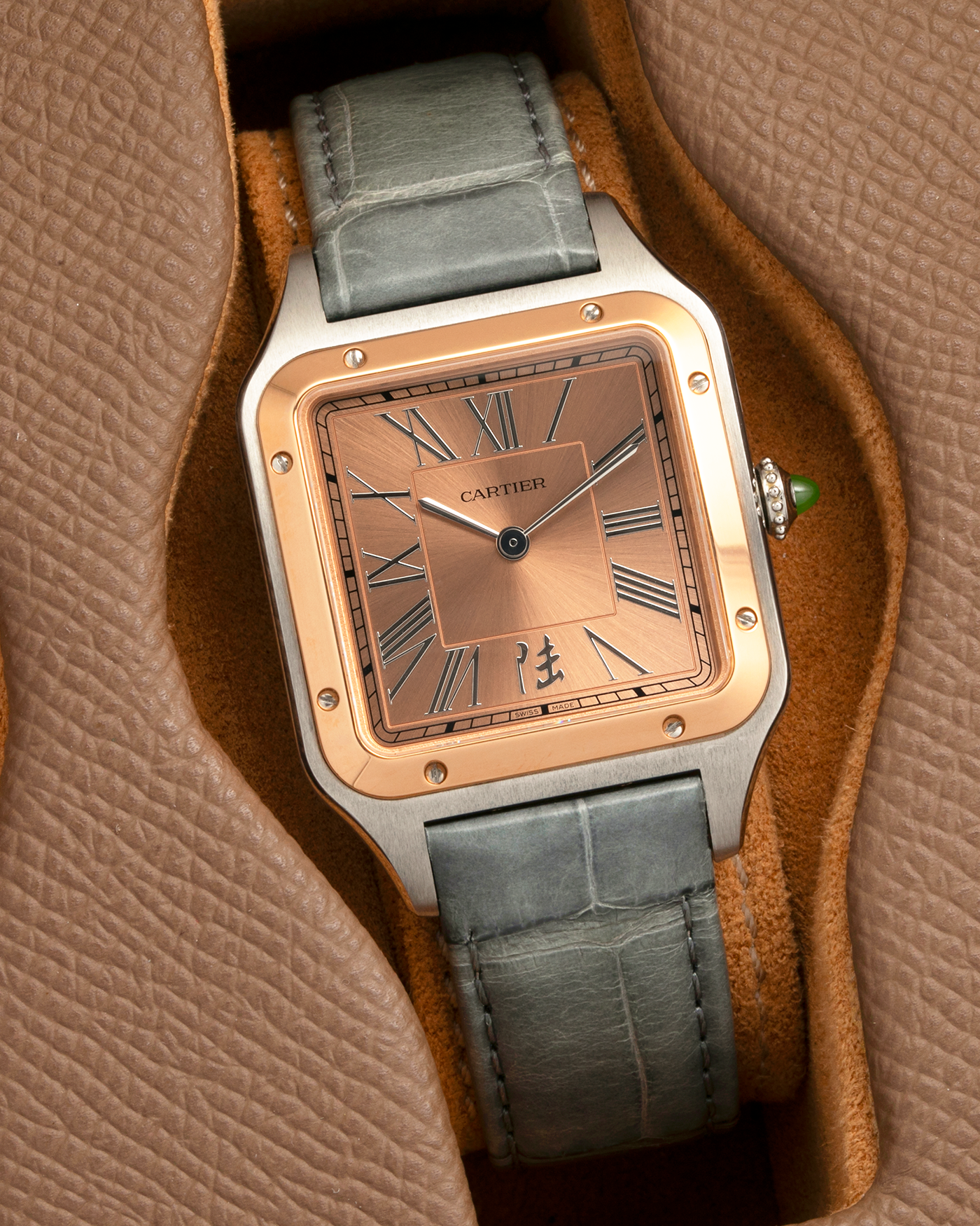Brand: Cartier
Year: 2023
Model: Santos-Dumont ‘China’, Limited Edition of 300 pieces
Reference Number: W2SA0027
Material: Stainless Steel Case and 18-carat Rose Gold Bezel
Movement: Cartier Cal. 430 MC, Manual-Winding
Case Dimensions: 43.5mm (Including Lugs) x 31.4mm
Lug Width: 18mm
Strap: Cartier Anthracite Grey Alligator Leather Strap with Signed Stainless Steel Tang Buckle