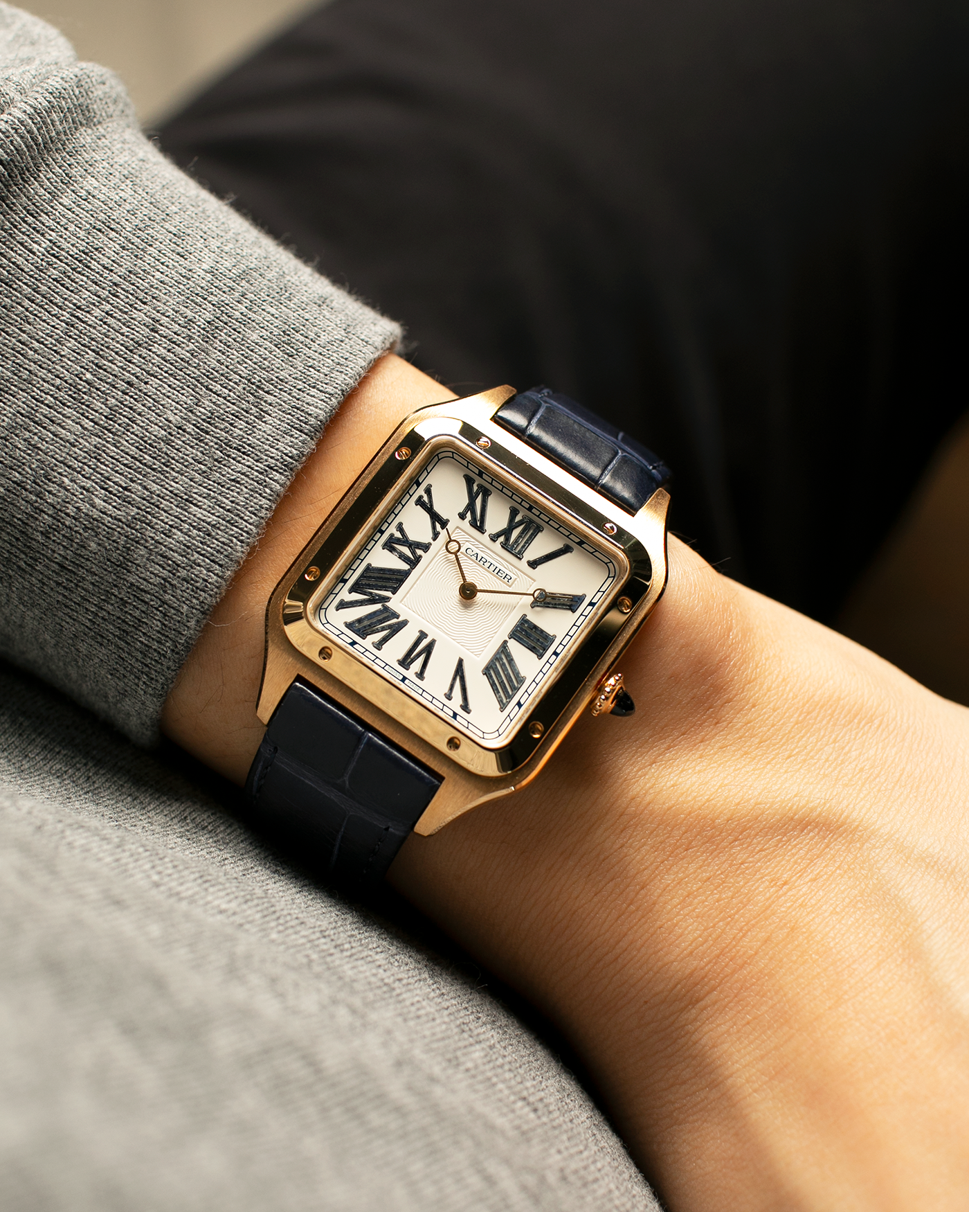 Brand: Cartier
Year: 2023
Model: Santos-Dumont ‘Dumortierite’, Limited Edition of 200 pieces in this Configuration
Reference Number: WGSA0084
Material: 18-carat Yellow Gold Case and Dumortierite Roman Numerals
Movement: Cartier Cal. 430 MC, Manual-Winding
Case Dimensions: 46.6mm (Including Lugs) x 33.9mm x 7.5mm
Lud Width: 18mm
Strap: Cartier Dark Navy Alligator Leather Strap with Signed 18-carat Yellow Gold Tang Buckle