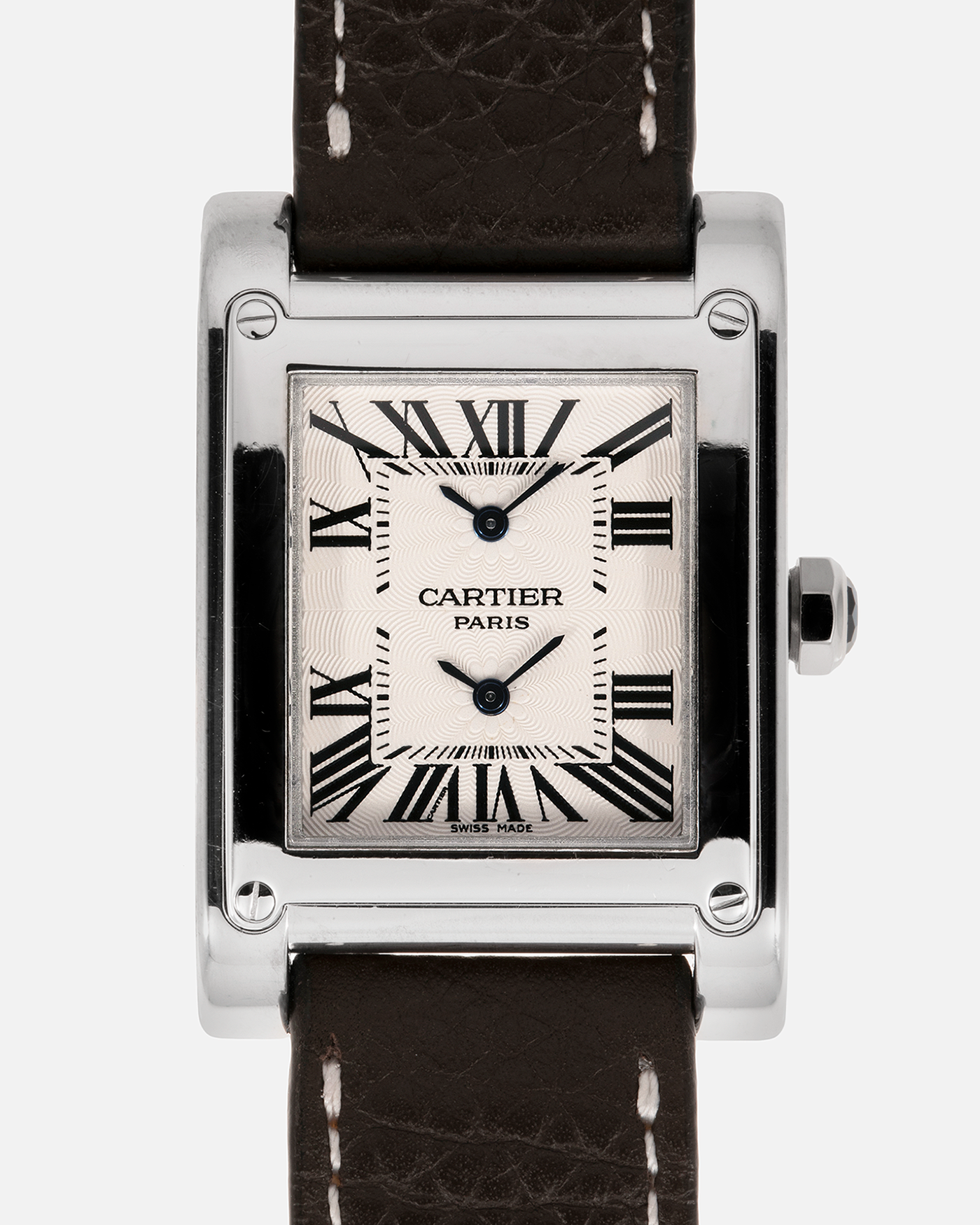 Brand: Cartier Year: 2000s Model: Tank à Vis Dual Time Reference: 2552 Material: 18-carat White Gold Movement: Piaget Ebauche Based Cal. 9901MC, Manual-Winding Case Diameter: 28mm x 32mm Strap: Subdial Dark Brown Textured Calf Leather Strap with Signed 18-carat White Gold Deployant Clasp