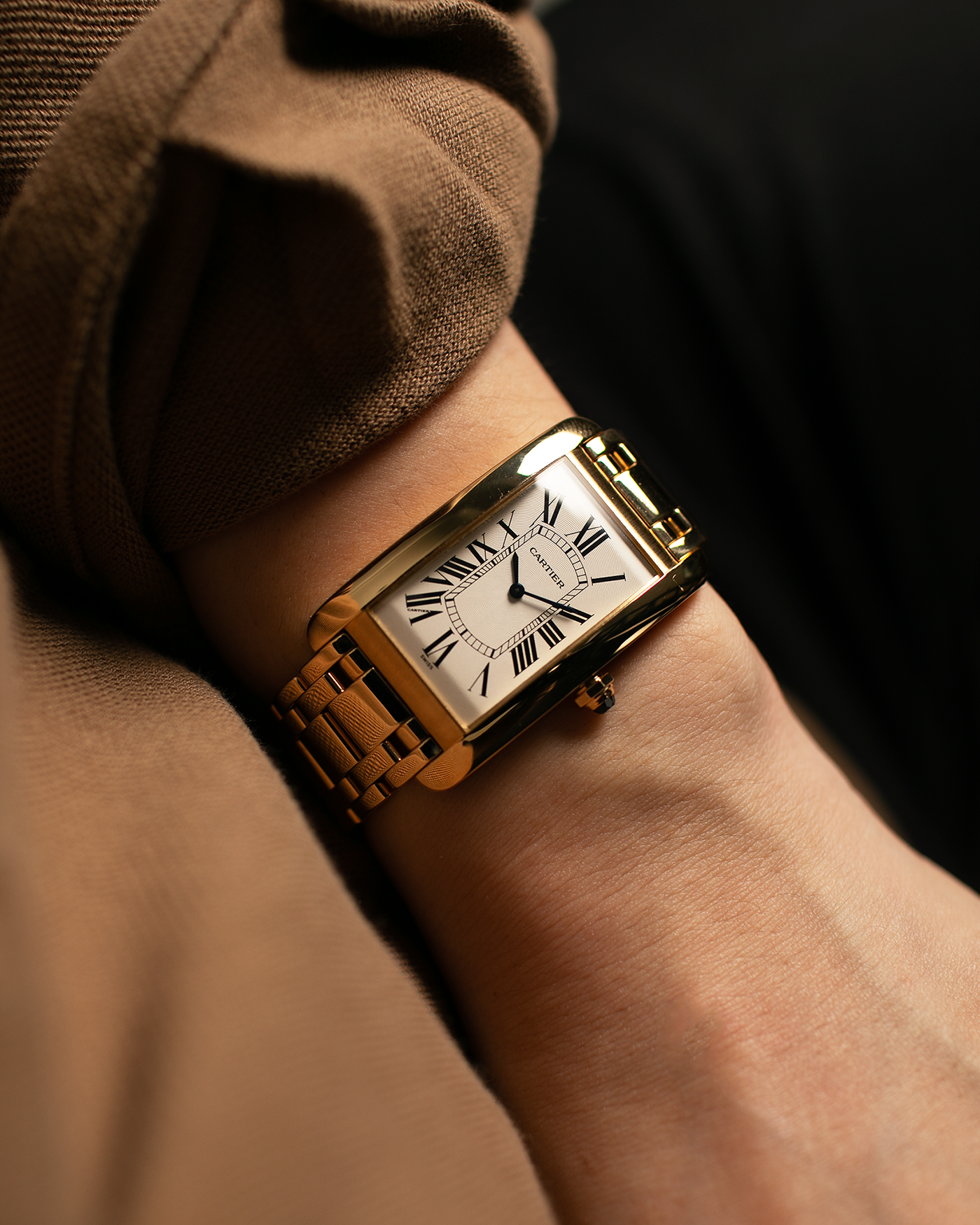 Brand: Cartier Year: 1990s Model: Tank Américaine Reference: 1735-1 Material: 18-carat Yellow Gold Movement: Cartier Cal. 430 MC (Piaget Cal. 430P based), Manual-Winding Case Dimensions: 44mm x 26mm x 7.5mm Lug Width: 18mm Bracelet: Cartier Bracelet in full 18-carat Yellow Gold with Signed Butterfly Clasp