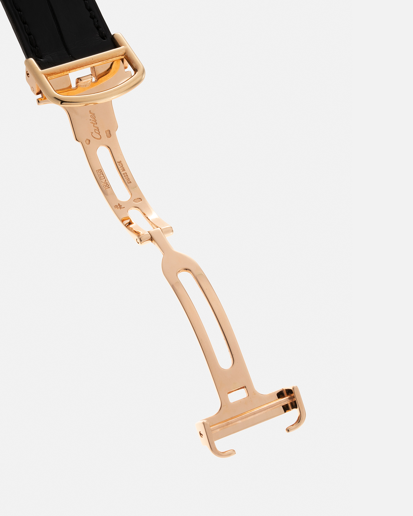 Brand: Cartier Year: 2006 Model: Tank Asymétrique CPCP, Limited Edition of 150 pieces Reference Number: 2842 Material: 18-carat Yellow Gold Movement: Cartier Cal. 9770 MC, Manual-Winding Case Diameter: 26.5mm x 41mm x 7.5mm Strap: Cartier Black Alligator Leather with Signed 18-carat Yellow Gold Deployant Clasp