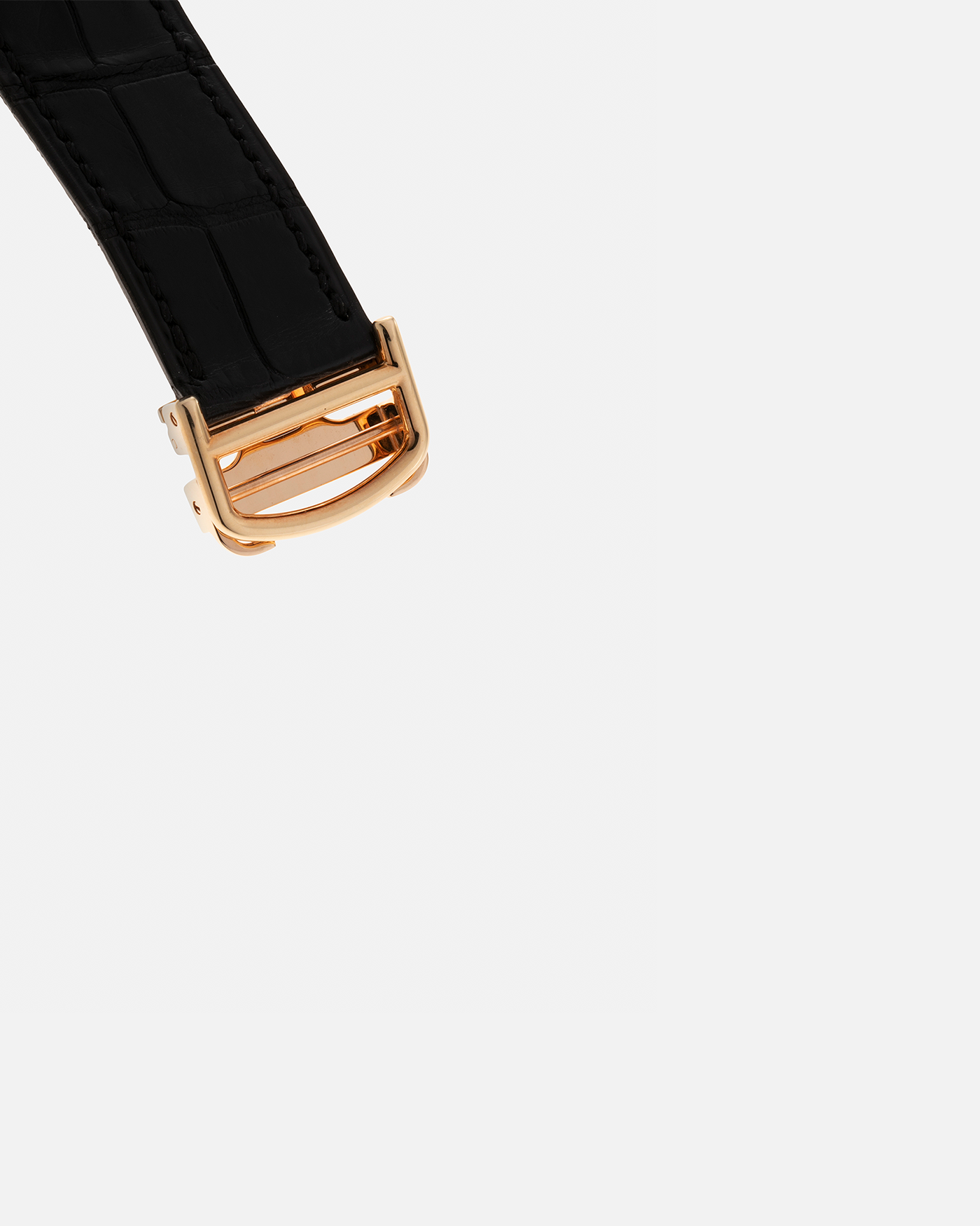 Brand: Cartier Year: 2006 Model: Tank Asymétrique CPCP, Limited Edition of 150 pieces Reference Number: 2842 Material: 18-carat Yellow Gold Movement: Cartier Cal. 9770 MC, Manual-Winding Case Diameter: 26.5mm x 41mm x 7.5mm Strap: Cartier Black Alligator Leather with Signed 18-carat Yellow Gold Deployant Clasp