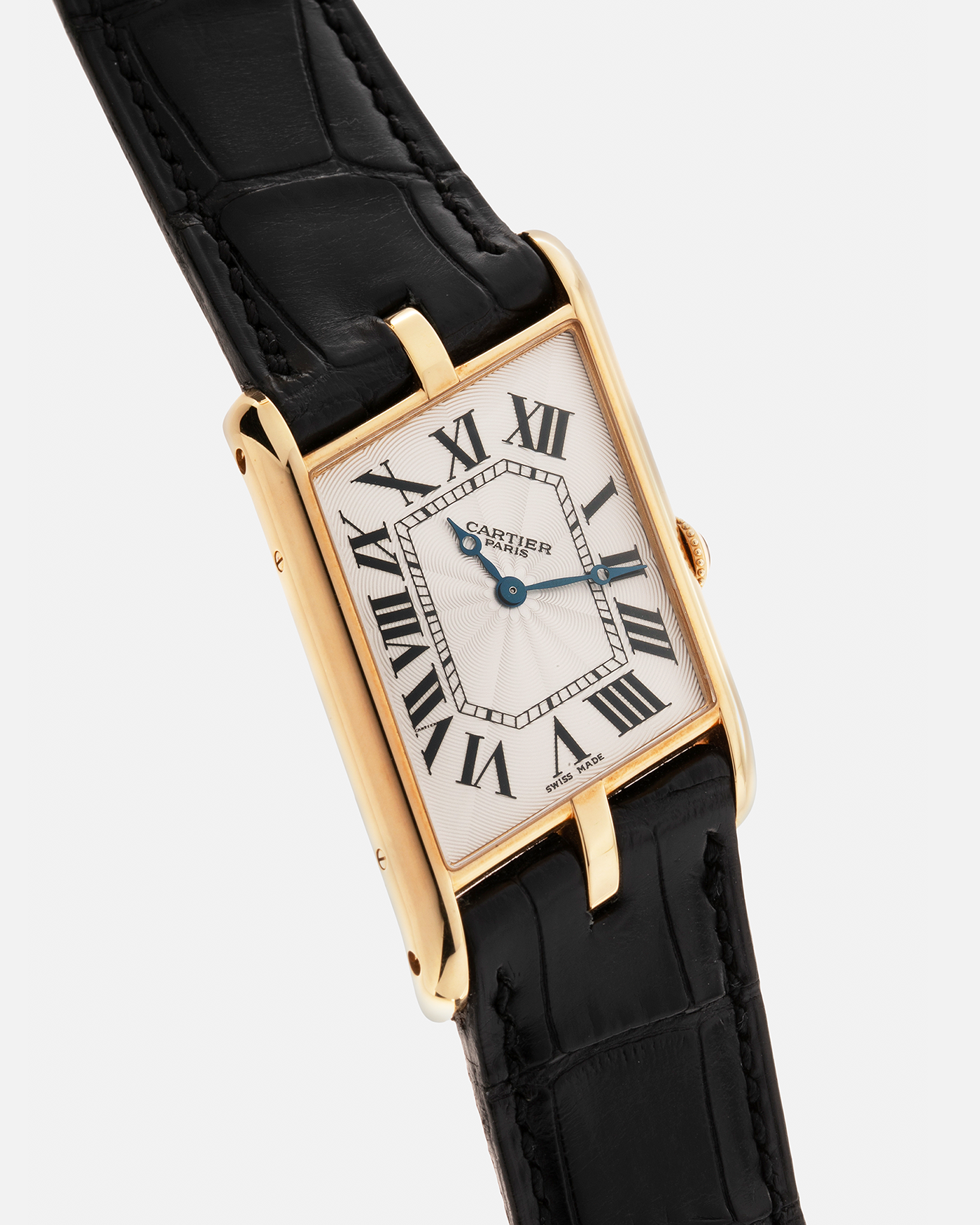 Brand: Cartier Year: 2006 Model: Tank Asymétrique CPCP, Limited Edition of 150 pieces Reference Number: 2842 Material: 18-carat Yellow Gold Movement: Cartier Cal. 9770 MC, Manual-Winding Case Diameter: 26.5mm x 41mm x 7.5mm Strap: Cartier Black Alligator Leather with Signed 18-carat Yellow Gold Deployant Clasp