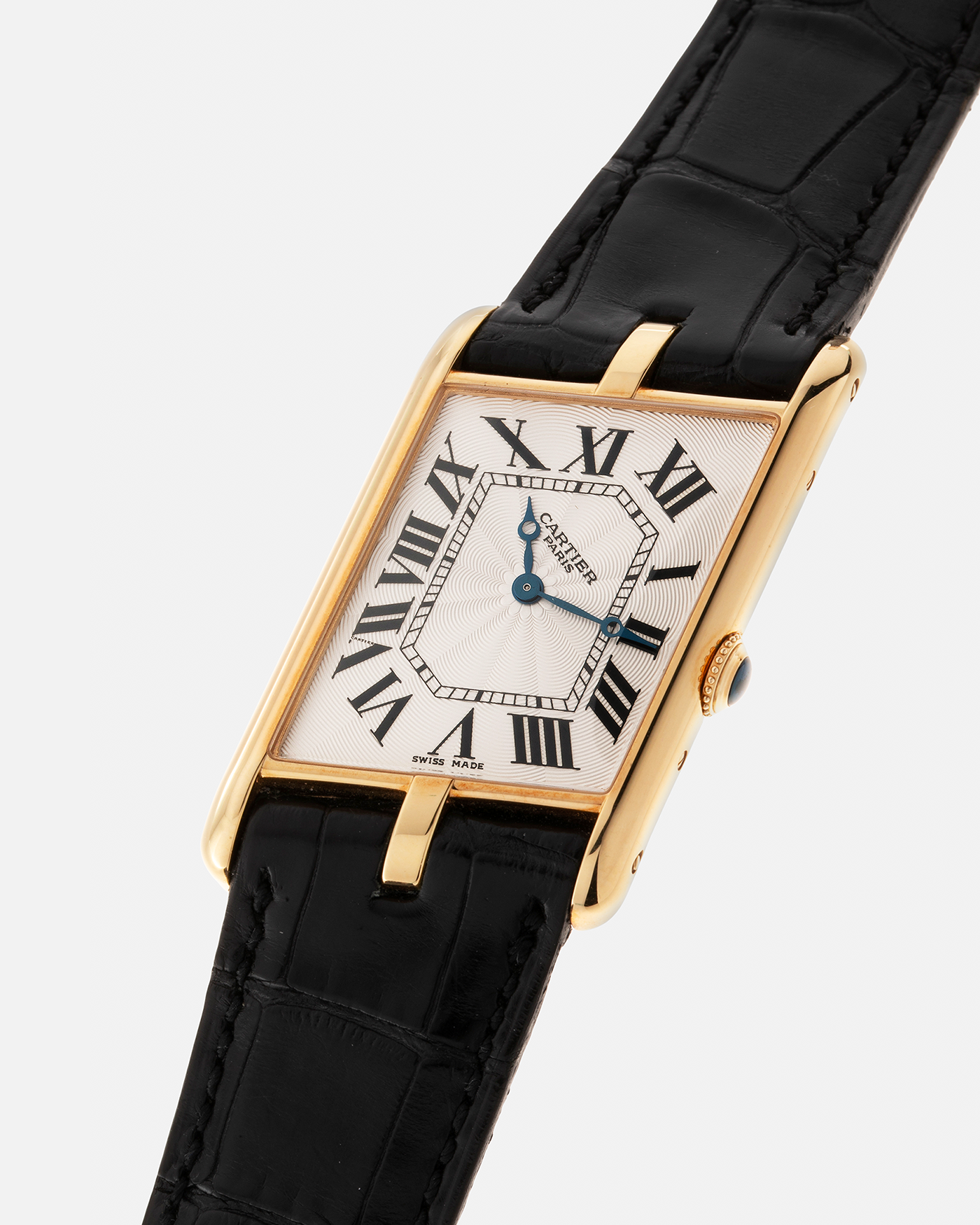 Brand: Cartier Year: 2006 Model: Tank Asymétrique CPCP, Limited Edition of 150 pieces Reference Number: 2842 Material: 18-carat Yellow Gold Movement: Cartier Cal. 9770 MC, Manual-Winding Case Diameter: 26.5mm x 41mm x 7.5mm Strap: Cartier Black Alligator Leather with Signed 18-carat Yellow Gold Deployant Clasp