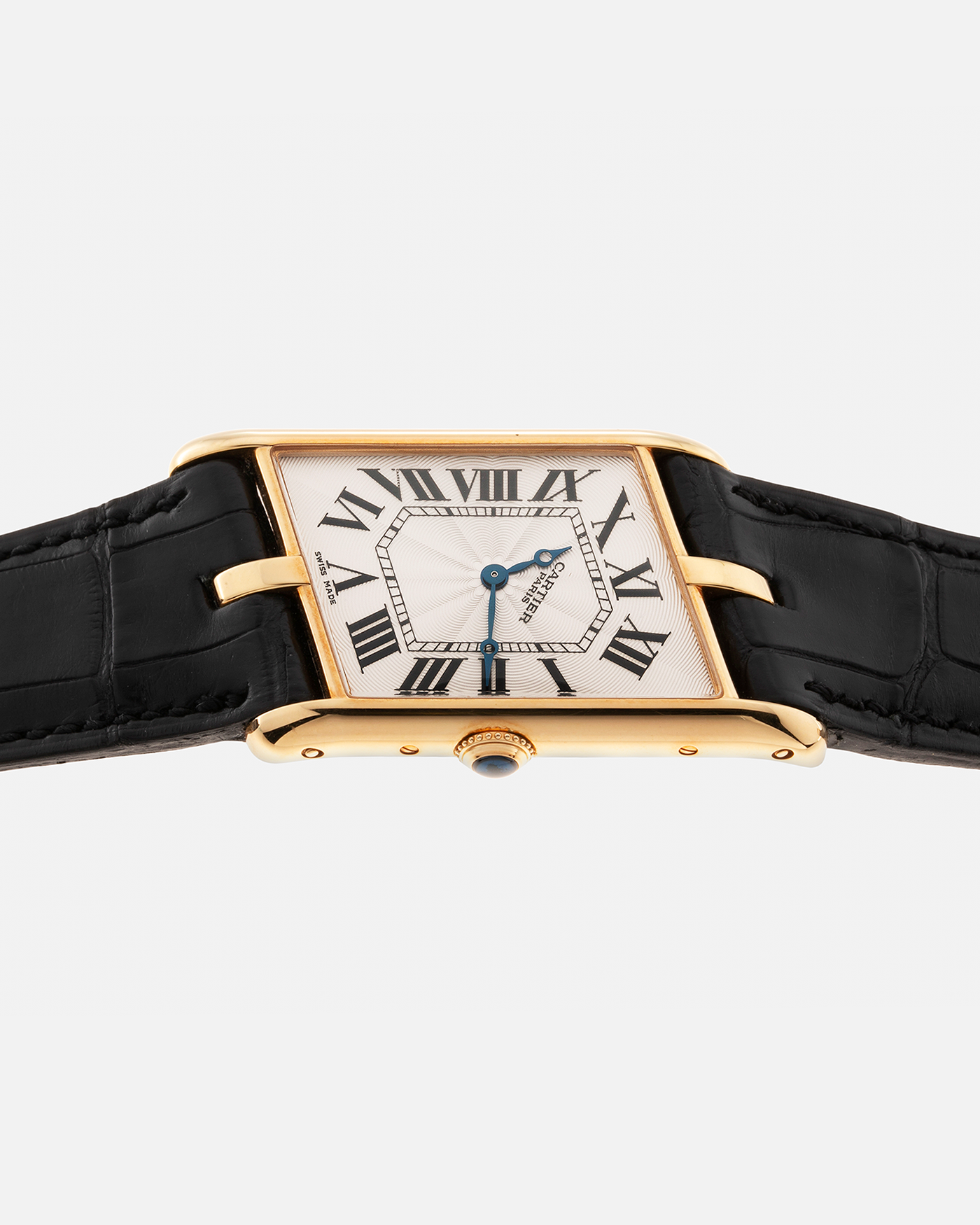 Brand: Cartier Year: 2006 Model: Tank Asymétrique CPCP, Limited Edition of 150 pieces Reference Number: 2842 Material: 18-carat Yellow Gold Movement: Cartier Cal. 9770 MC, Manual-Winding Case Diameter: 26.5mm x 41mm x 7.5mm Strap: Cartier Black Alligator Leather with Signed 18-carat Yellow Gold Deployant Clasp