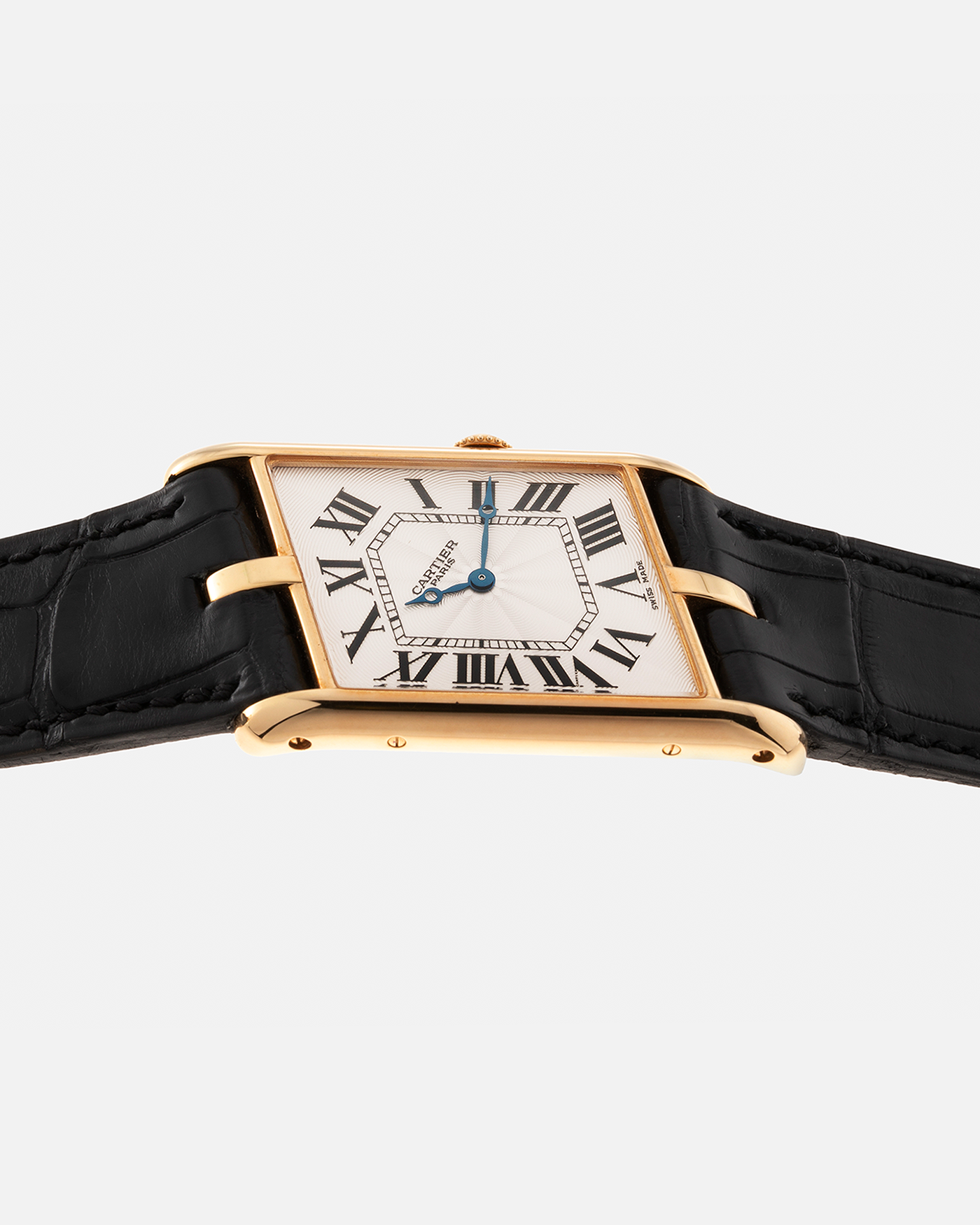 Brand: Cartier Year: 2006 Model: Tank Asymétrique CPCP, Limited Edition of 150 pieces Reference Number: 2842 Material: 18-carat Yellow Gold Movement: Cartier Cal. 9770 MC, Manual-Winding Case Diameter: 26.5mm x 41mm x 7.5mm Strap: Cartier Black Alligator Leather with Signed 18-carat Yellow Gold Deployant Clasp