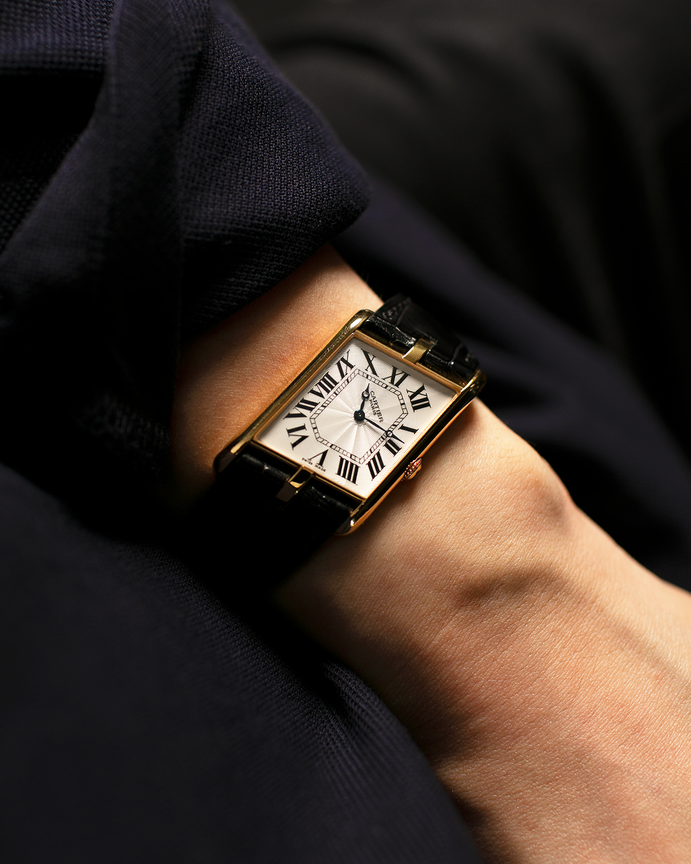 Brand: Cartier Year: 2006 Model: Tank Asymétrique CPCP, Limited Edition of 150 pieces Reference Number: 2842 Material: 18-carat Yellow Gold Movement: Cartier Cal. 9770 MC, Manual-Winding Case Diameter: 26.5mm x 41mm x 7.5mm Strap: Cartier Black Alligator Leather with Signed 18-carat Yellow Gold Deployant Clasp