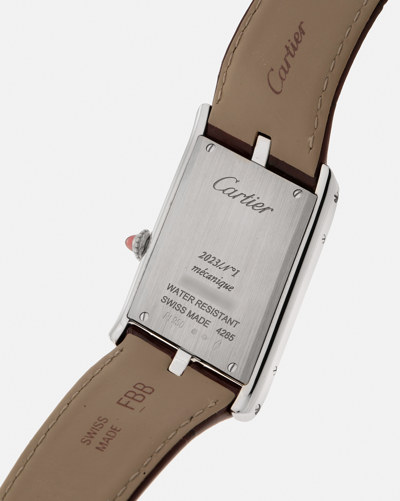 Brand: Cartier
Year: 2023
Model: Tank Asymétrique
Reference Number: WGTA0173, New Special Order
Case Material: Platinum 950
Movement: Cartier Cal. 1917MC, Manual-Winding
Case Dimensions: 47.15mm x 26.2mm x 6.38mm (44.5mm Lug-to-Lug)
Strap: Cartier Wine Red Alligator Leather Strap with Signed Platinum 950 Tang Buckle