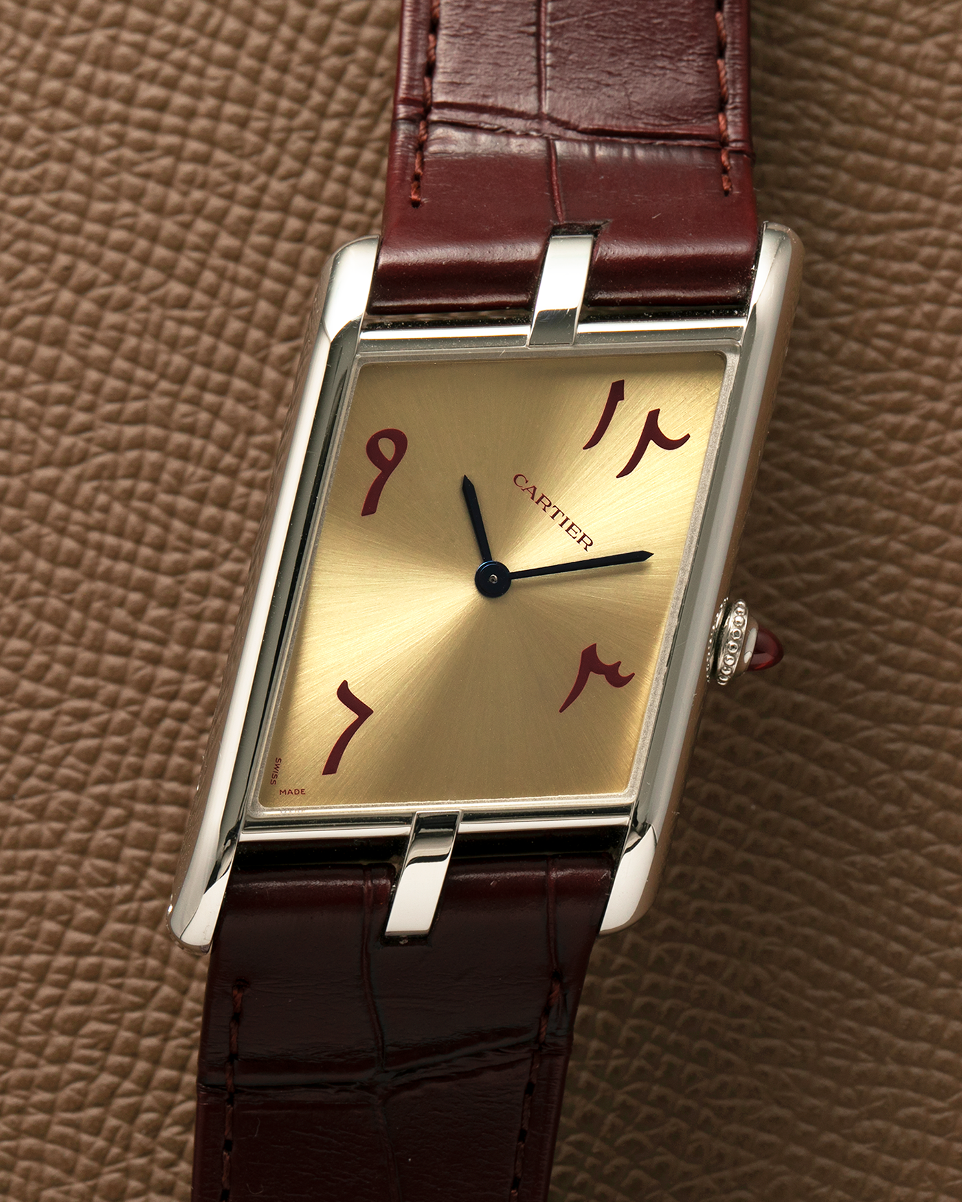 Brand: Cartier
Year: 2023
Model: Tank Asymétrique
Reference Number: WGTA0173, New Special Order
Case Material: Platinum 950
Movement: Cartier Cal. 1917MC, Manual-Winding
Case Dimensions: 47.15mm x 26.2mm x 6.38mm (44.5mm Lug-to-Lug)
Strap: Cartier Wine Red Alligator Leather Strap with Signed Platinum 950 Tang Buckle
