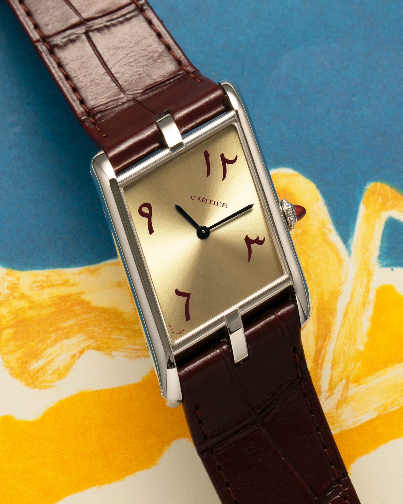Brand: Cartier
Year: 2023
Model: Tank Asymétrique
Reference Number: WGTA0173, New Special Order
Case Material: Platinum 950
Movement: Cartier Cal. 1917MC, Manual-Winding
Case Dimensions: 47.15mm x 26.2mm x 6.38mm (44.5mm Lug-to-Lug)
Strap: Cartier Wine Red Alligator Leather Strap with Signed Platinum 950 Tang Buckle
