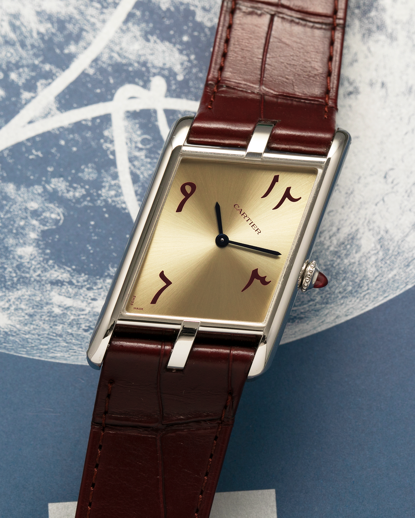 Brand: Cartier
Year: 2023
Model: Tank Asymétrique
Reference Number: WGTA0173, New Special Order
Case Material: Platinum 950
Movement: Cartier Cal. 1917MC, Manual-Winding
Case Dimensions: 47.15mm x 26.2mm x 6.38mm (44.5mm Lug-to-Lug)
Strap: Cartier Wine Red Alligator Leather Strap with Signed Platinum 950 Tang Buckle
