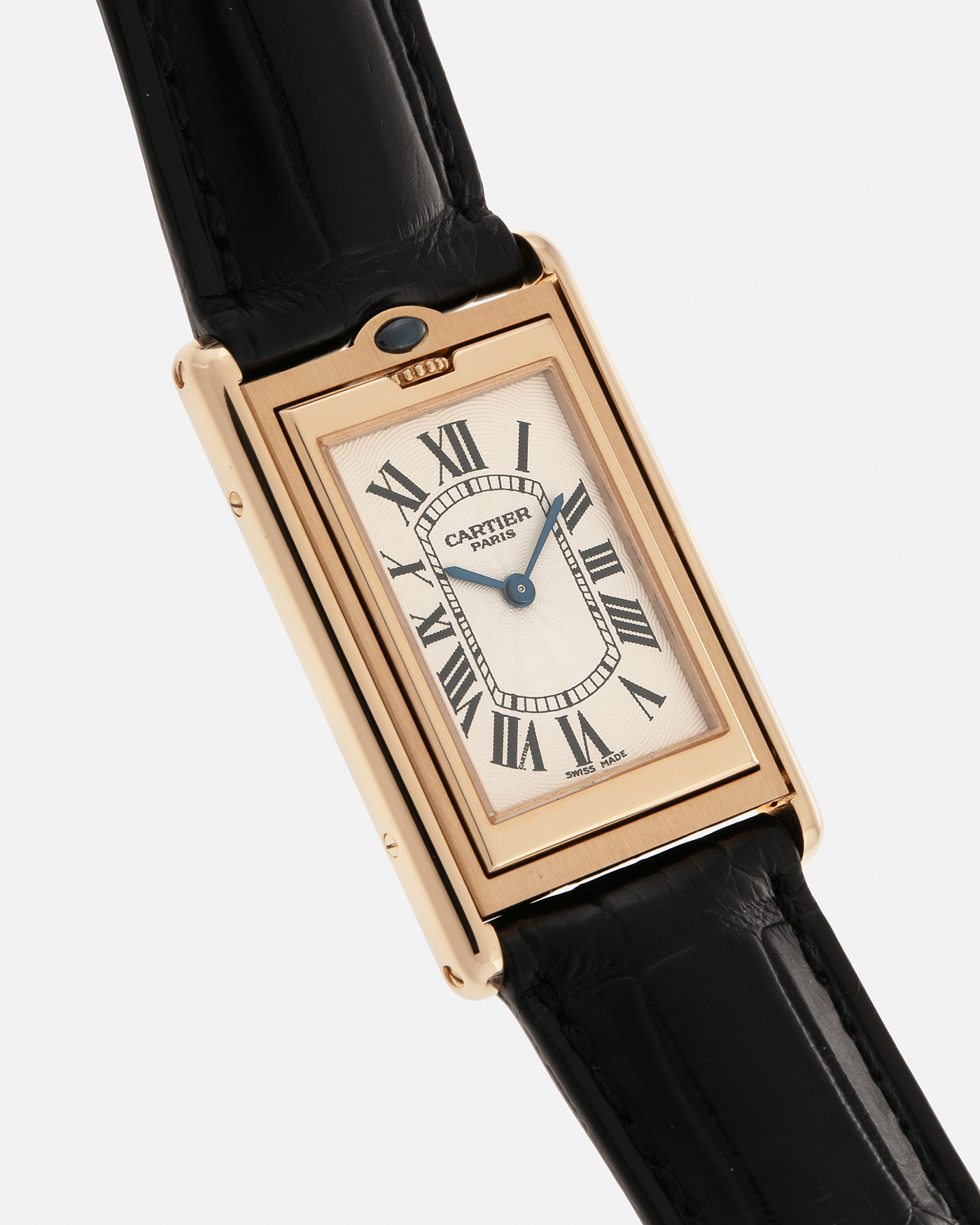 Brand: Cartier
Year: 2000
Model: Tank Basculante Collection Privé CPCP Millenium, Limited to 365 Pieces
Reference: 2391
Material: 18-carat Yellow Gold
Movement: Cartier Cal. 610 (Frédéric Piguet), Manual-Winding
Case Dimensions: 25mm x 39mm (Lug-to-Lug 38.7mm)
Lug Width: 20mm
Strap: Unnamed Padded Black Alligator Leather Strap with Signed 18-carat Yellow Gold Deployant Clasp