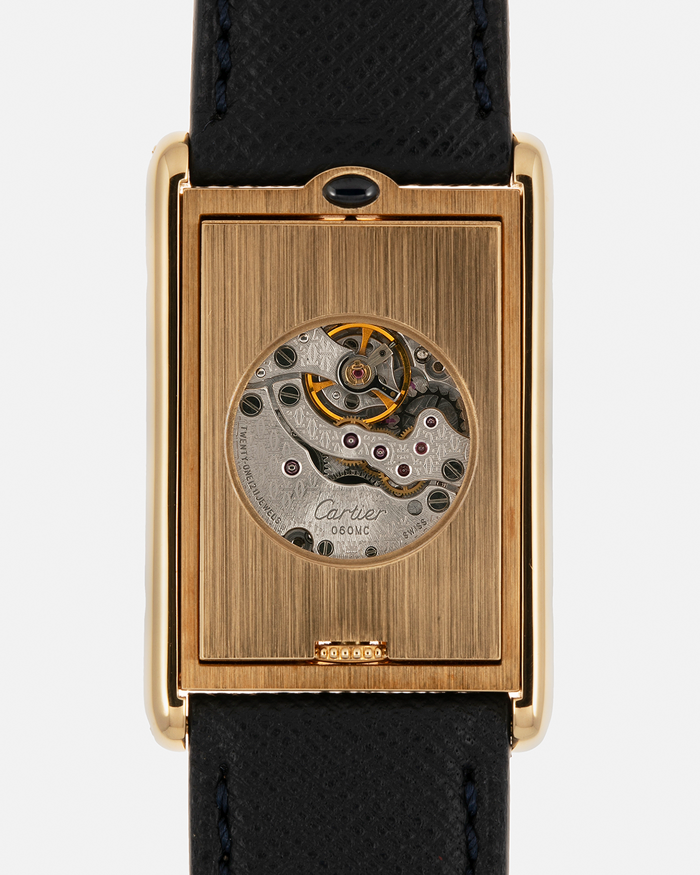 Brand: Cartier Year: 2000s Model: Collection Privée Cartier Paris Tank Basculante Material: 18-carat Yellow Gold Movement: Cartier Cal. 060MC (F. Piguet Cal. 610), Manual-Winding Case Diameter: 25mm x 39mm Lug Width: 20mm Strap: Nostime Navy Textured Calf Leather Strap with Signed 18-carat Yellow Gold Deployant Clasp, additional Cartier Brown Textured Calf Leather Strap (Used)