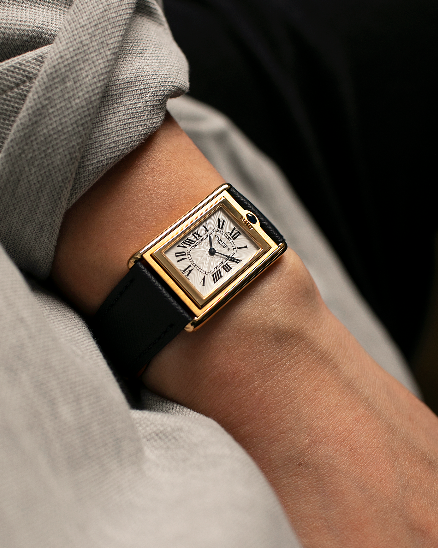 Brand: Cartier Year: 2000s Model: Collection Privée Cartier Paris Tank Basculante Material: 18-carat Yellow Gold Movement: Cartier Cal. 060MC (F. Piguet Cal. 610), Manual-Winding Case Diameter: 25mm x 39mm Lug Width: 20mm Strap: Nostime Navy Textured Calf Leather Strap with Signed 18-carat Yellow Gold Deployant Clasp, additional Cartier Brown Textured Calf Leather Strap (Used)
